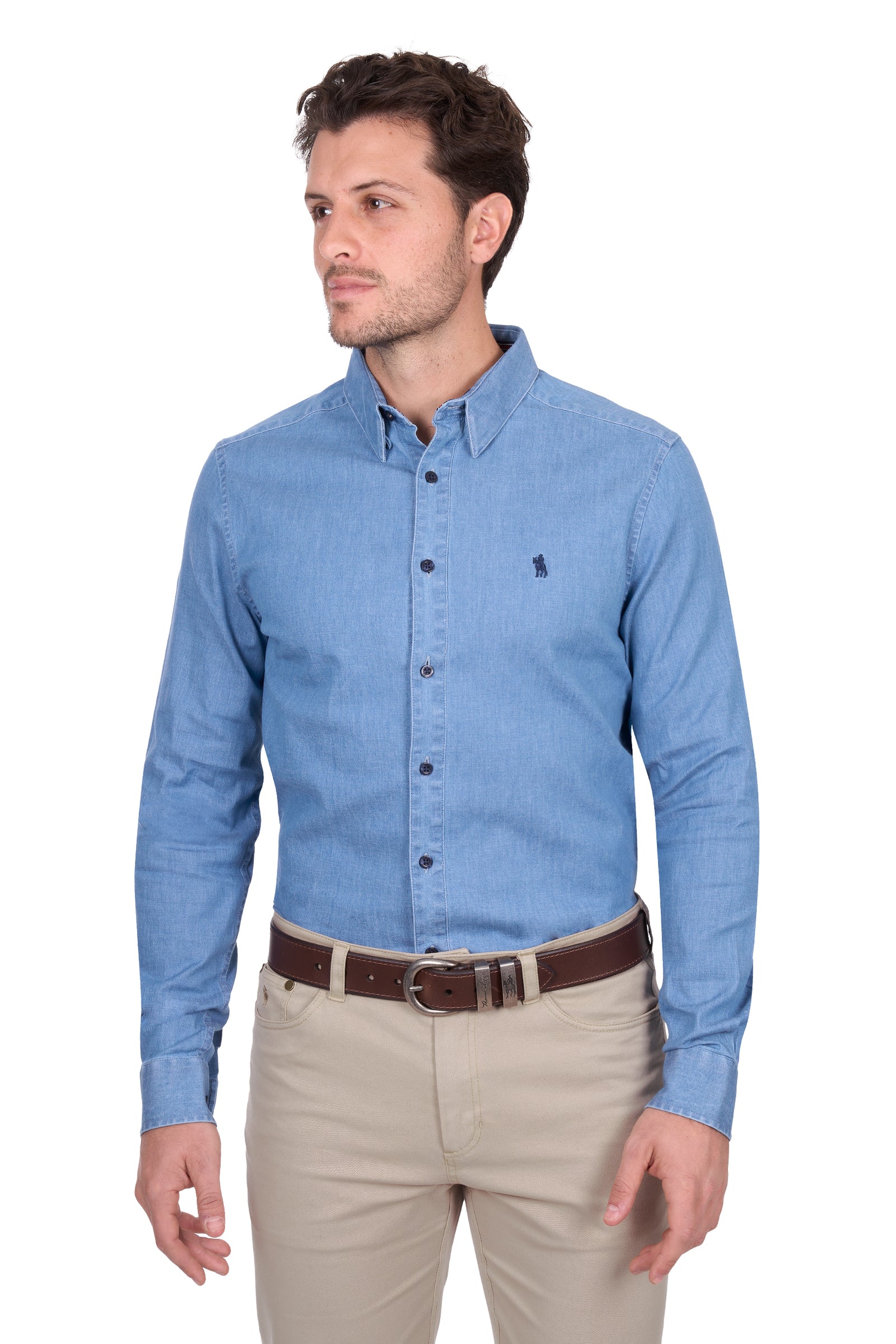 Man wearing a blue checkered shirt and beige pants with a brown belt.