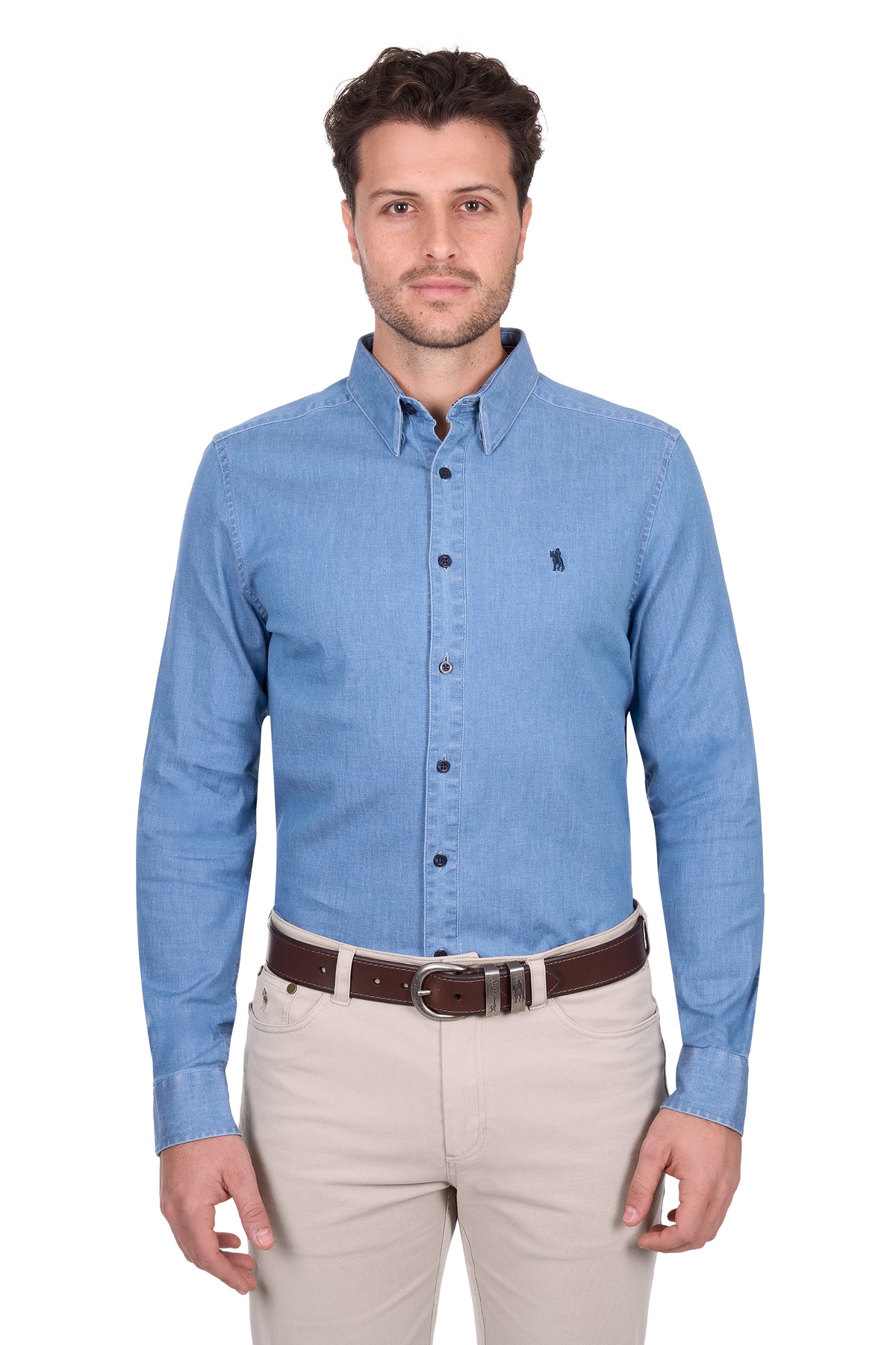 Man wearing a blue button-up shirt and beige pants on a white background