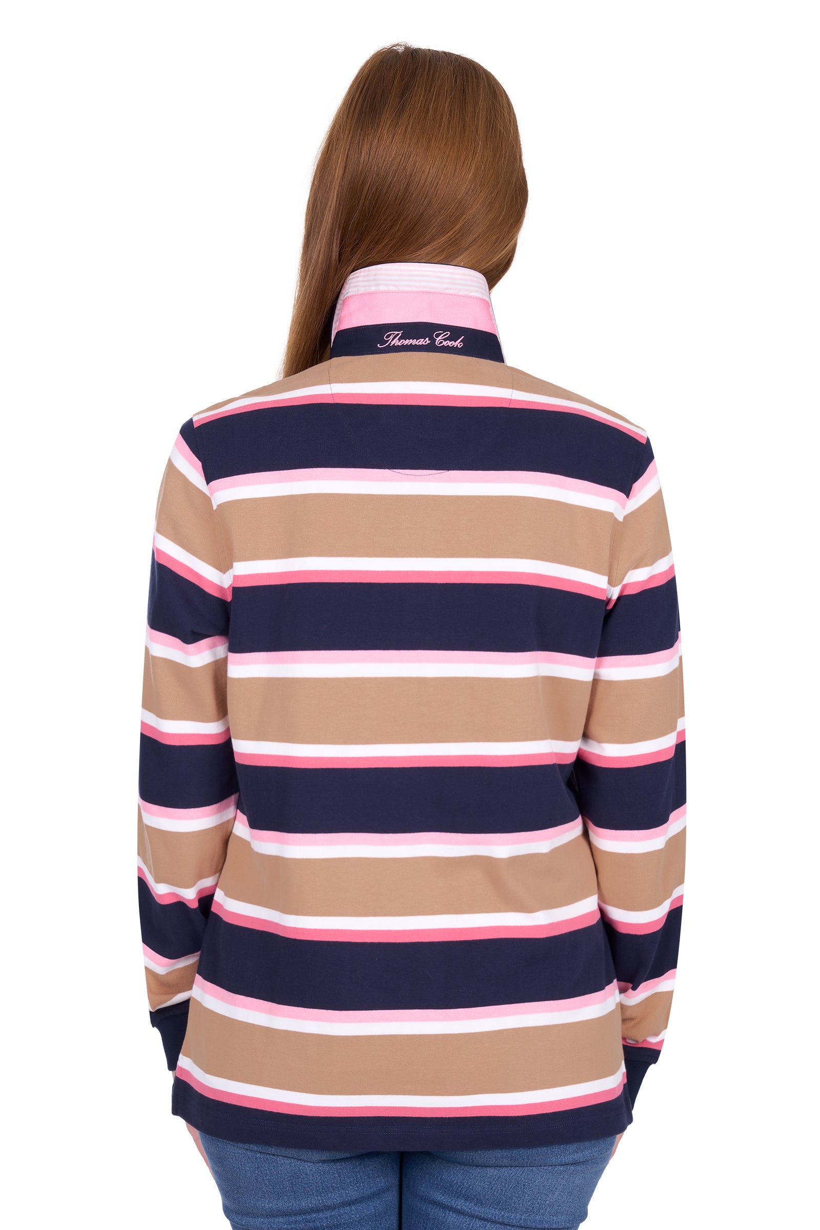 Woman wearing a striped shirt with a visible brand logo on a white background