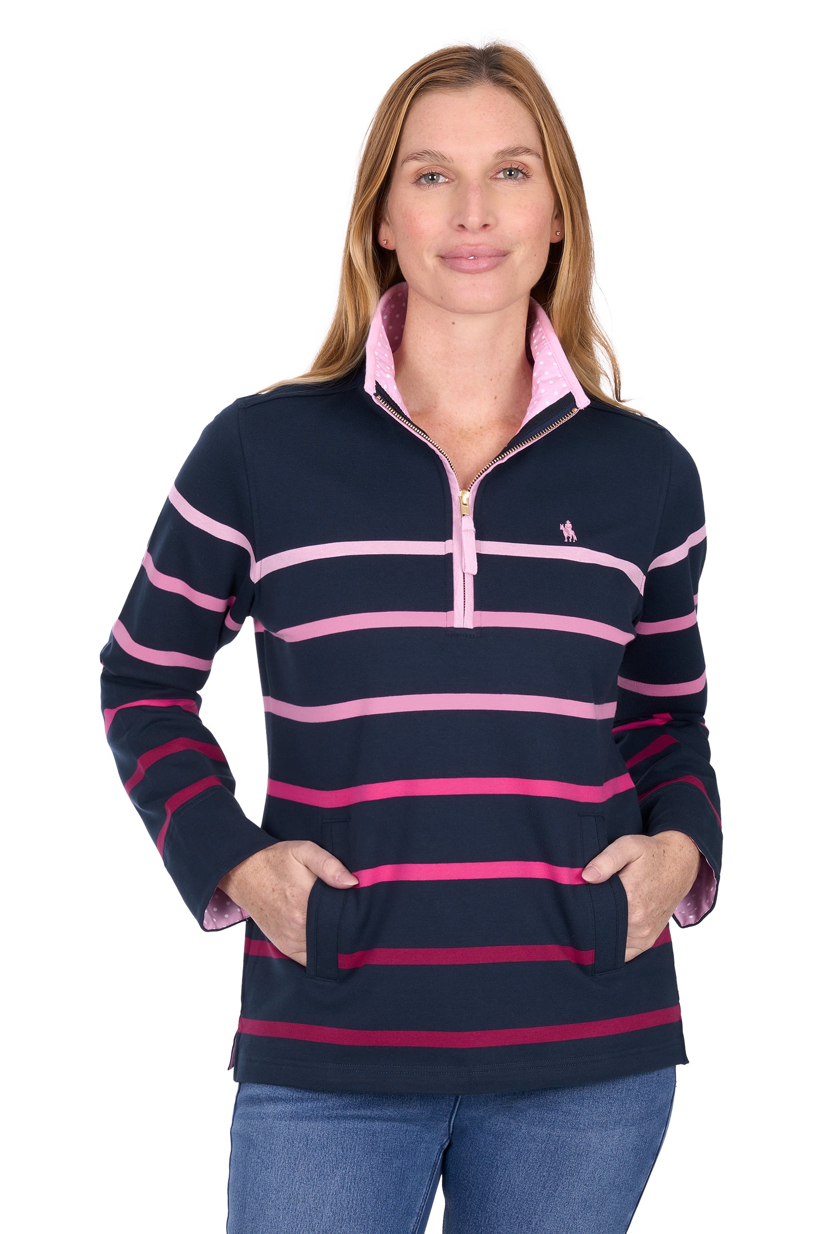 Woman wearing a navy and pink striped sweater with a white background