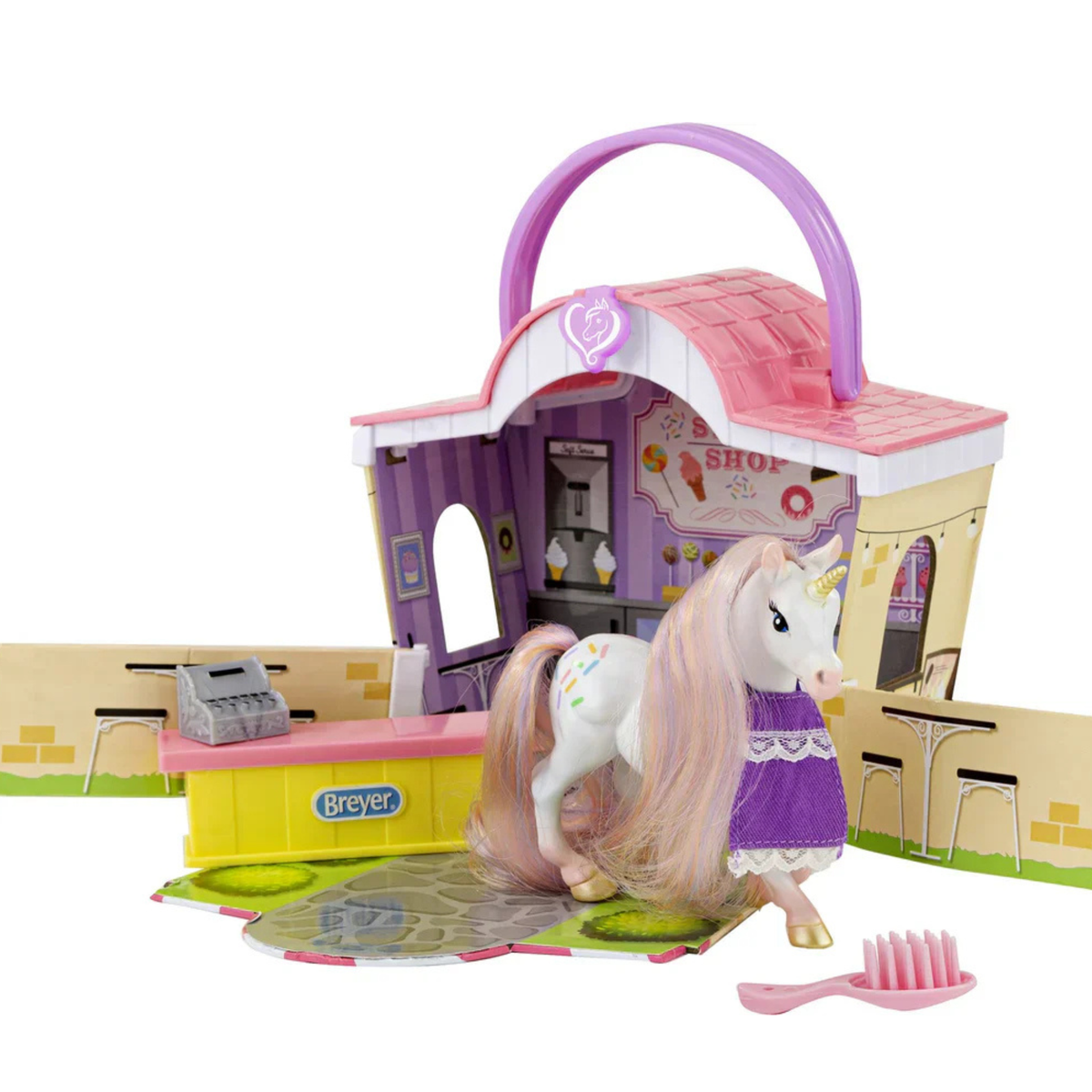 Breyer Mane Beauty Li'l Beauties Playset Sprinkles Sweet Shop. Toy horse and stable set with a unicorn figure, grooming brush, and accessories on a white background.