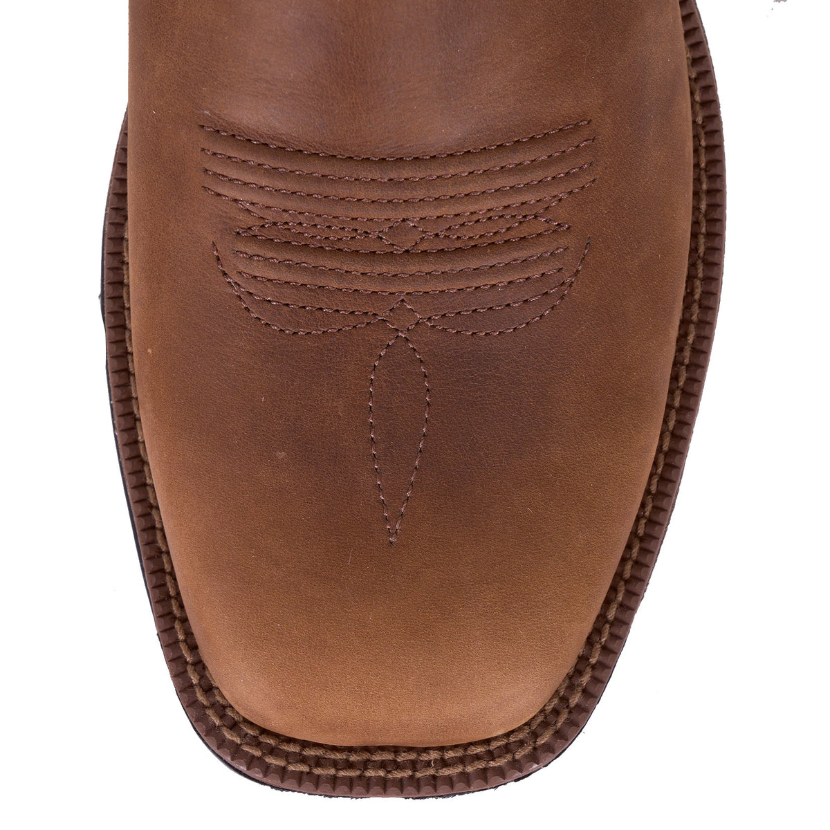 Twisted X Men's 5" Tech X1 Chelsea Boot. Close-up of a brown leather boot sole on a white background