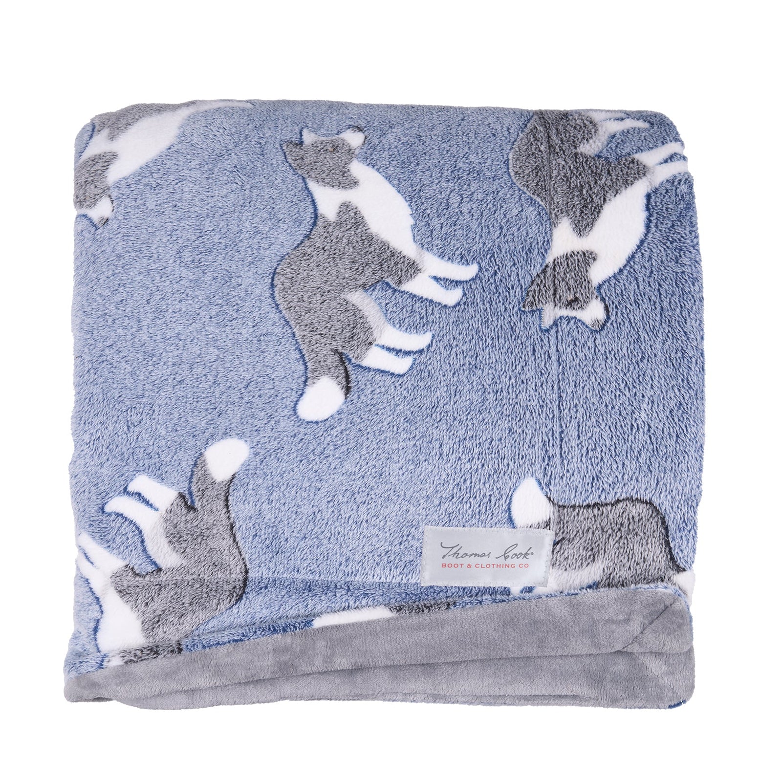 Blue blanket with gray cat illustrations on a white background