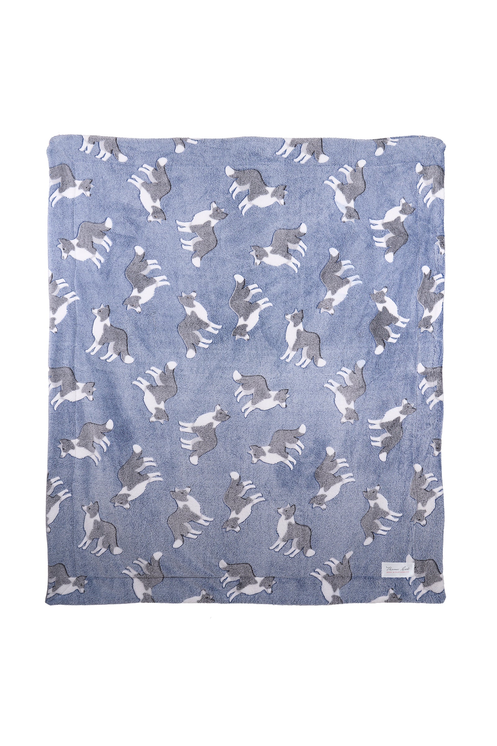 Blue blanket with gray cat illustrations on a white background