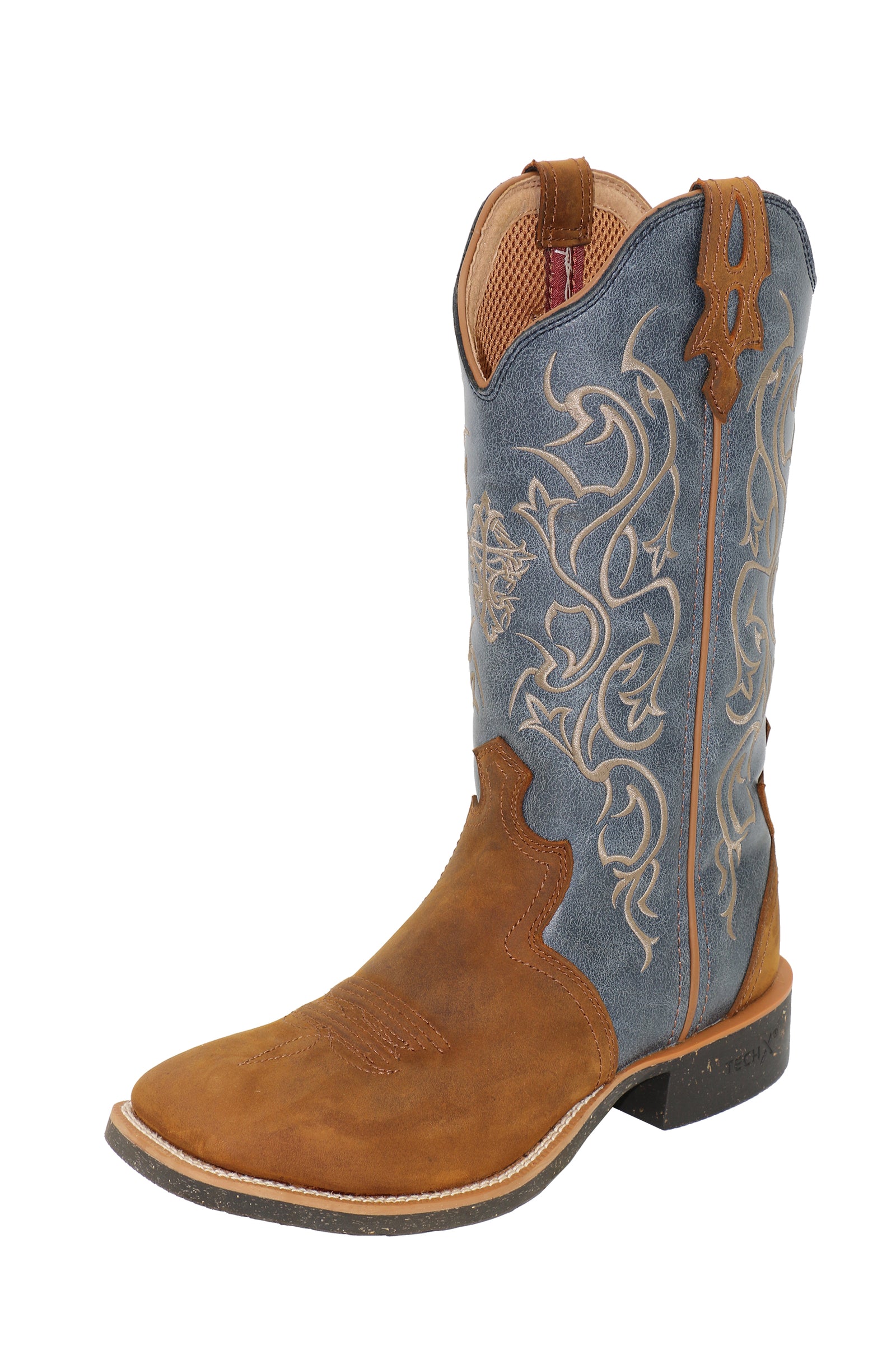 Brown and blue cowboy boot with intricate white embroidery on a white background