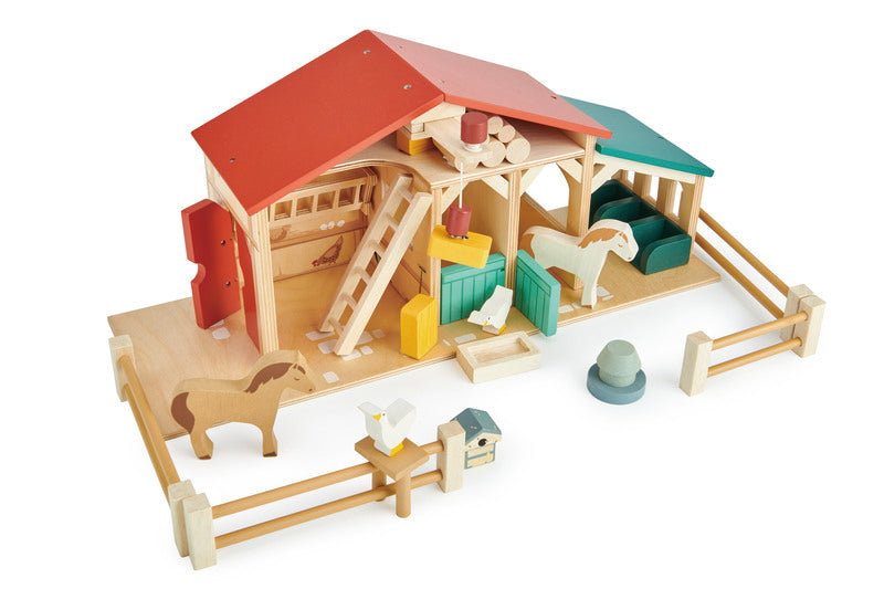 Kaleidoscope Tender Leaf Farm. Wooden toy barn set with animals and accessories on a white background
