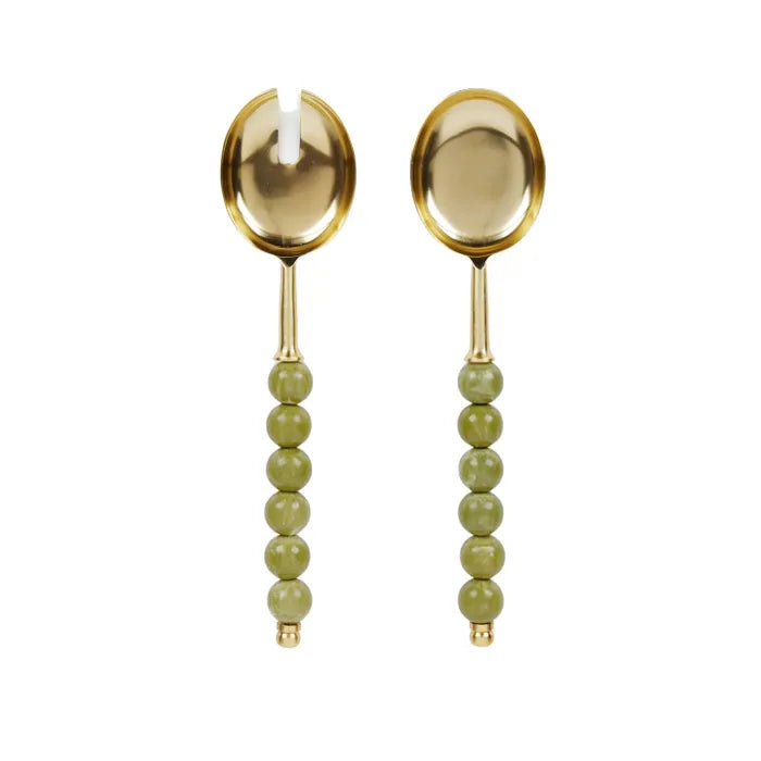 Amalia Resin Salad Server. Two gold spoons with green bead handles on a white background