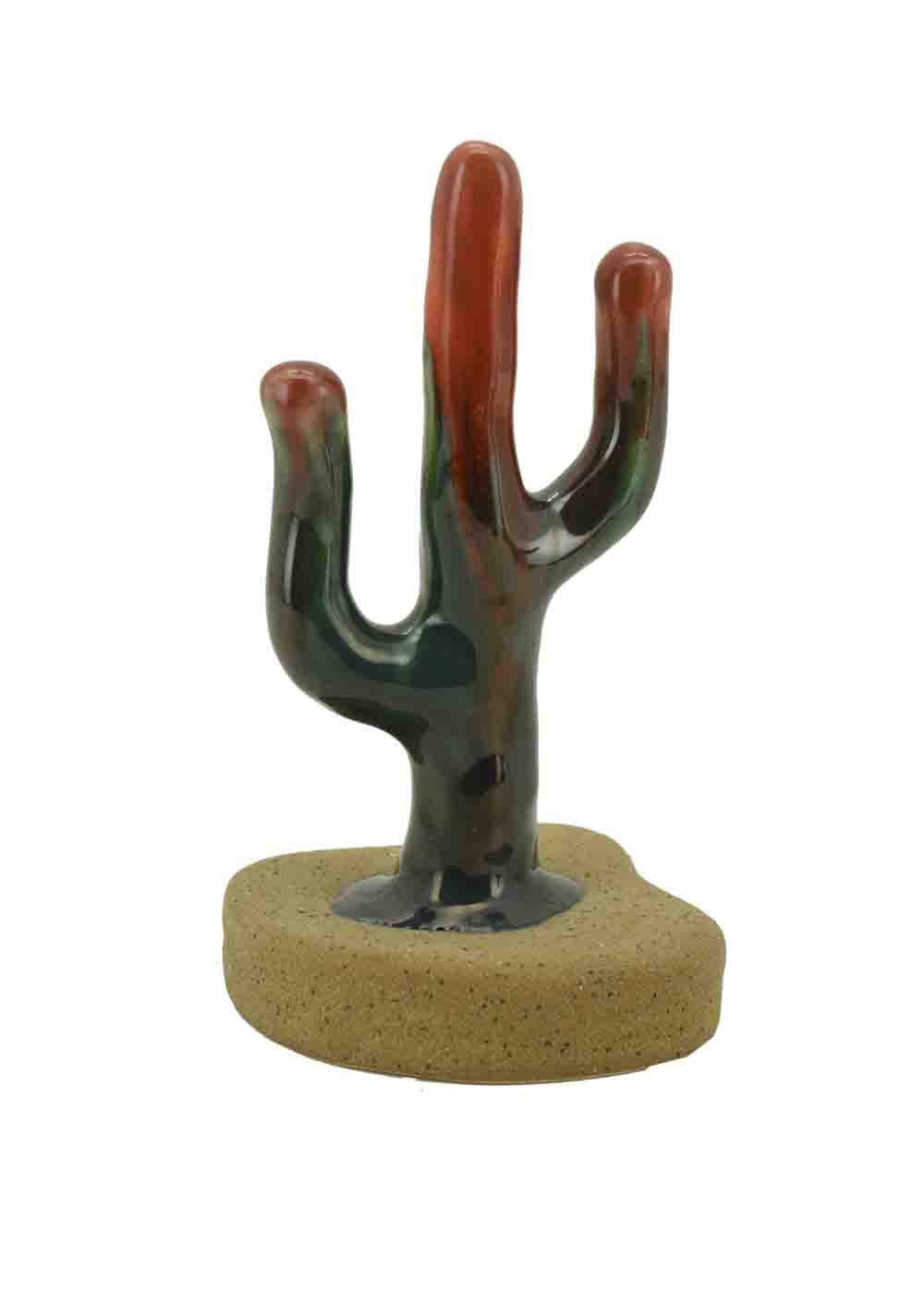 Ceramic cactus sculpture on a white background