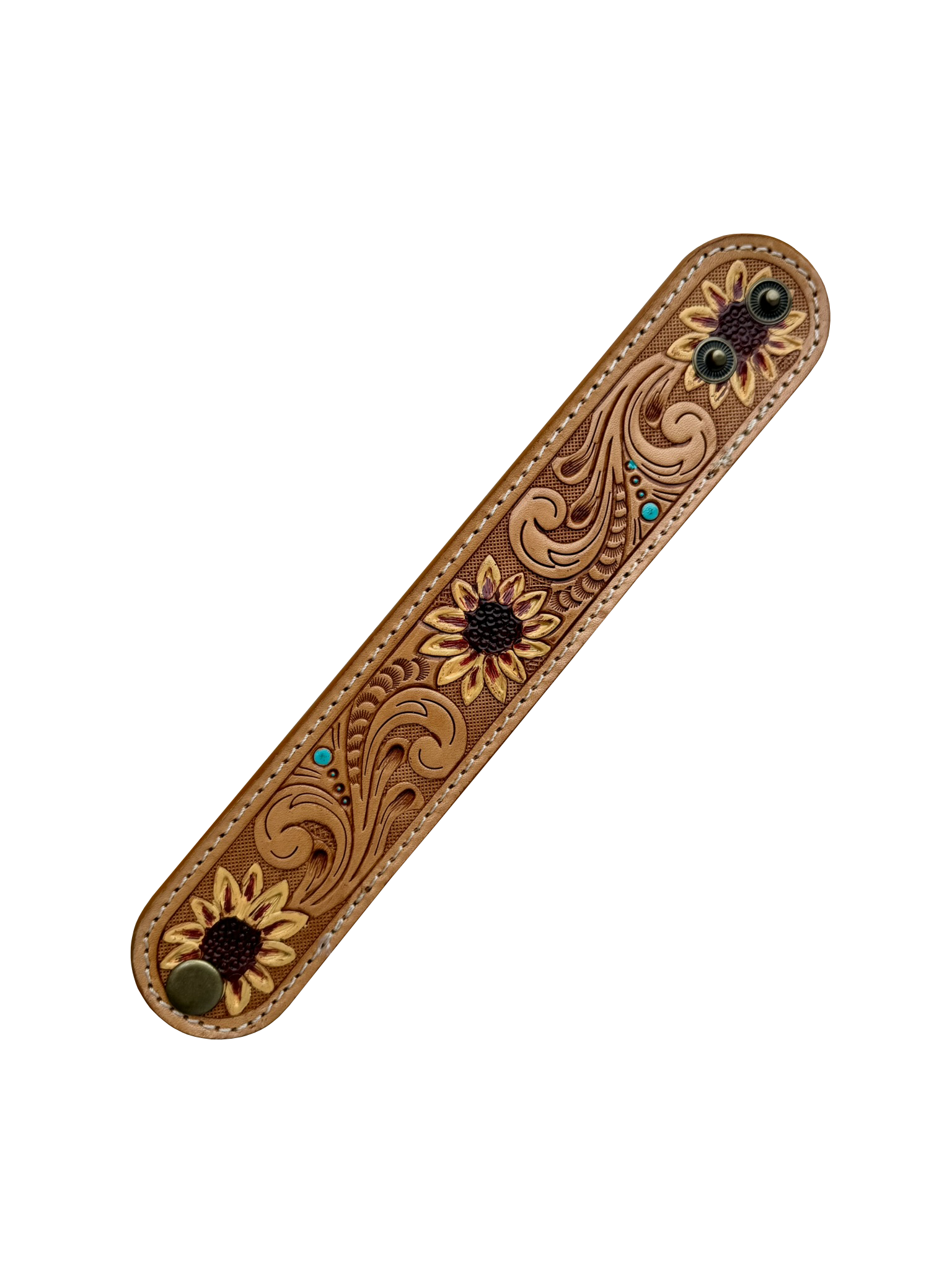 Sunflower Tooling Leather Wrist Band. Decorative wooden bar with sunflower designs and inlaid stones on a white background
