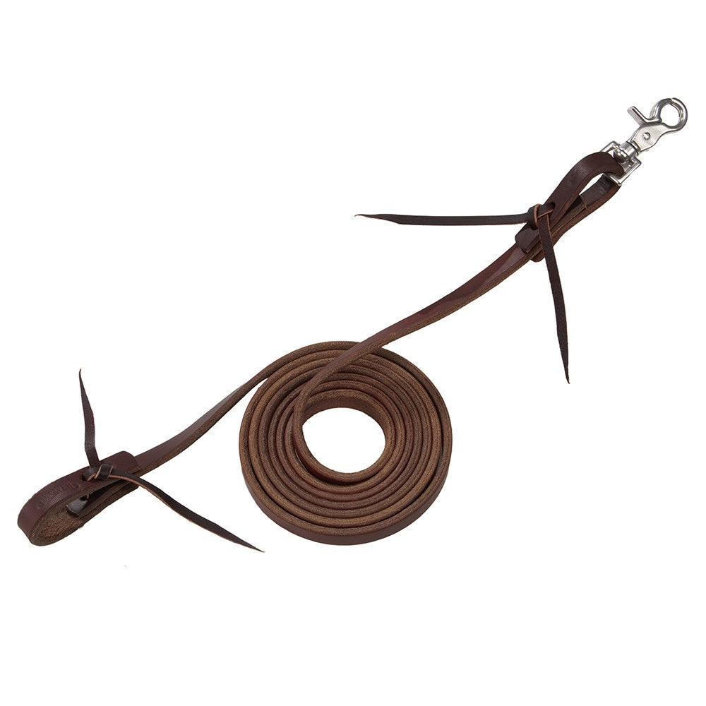 A dark brown leather horse lead rope, neatly coiled in the center with its metal snap hook attachment on the left and the lead loop on the right, set against a plain white background.