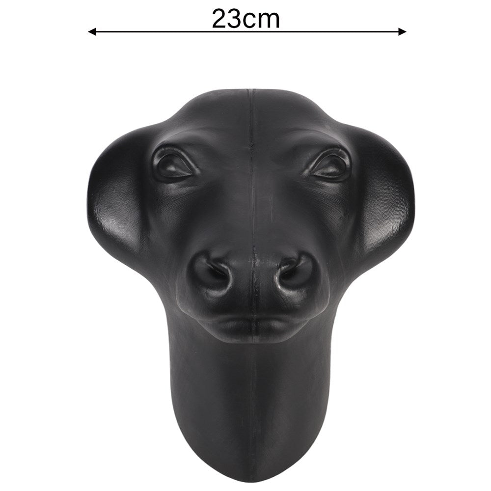 Plastic Calf Head w/Prongs. A black plastic calf head with mounting prongs used for training purposes in equestrian sports.