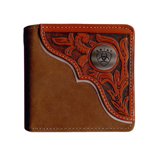 Ariat Men's Bi-Fold Wallet. A bi-fold wallet made of brown leather with a floral embossed design and a metal Ariat logo emblem on the front.