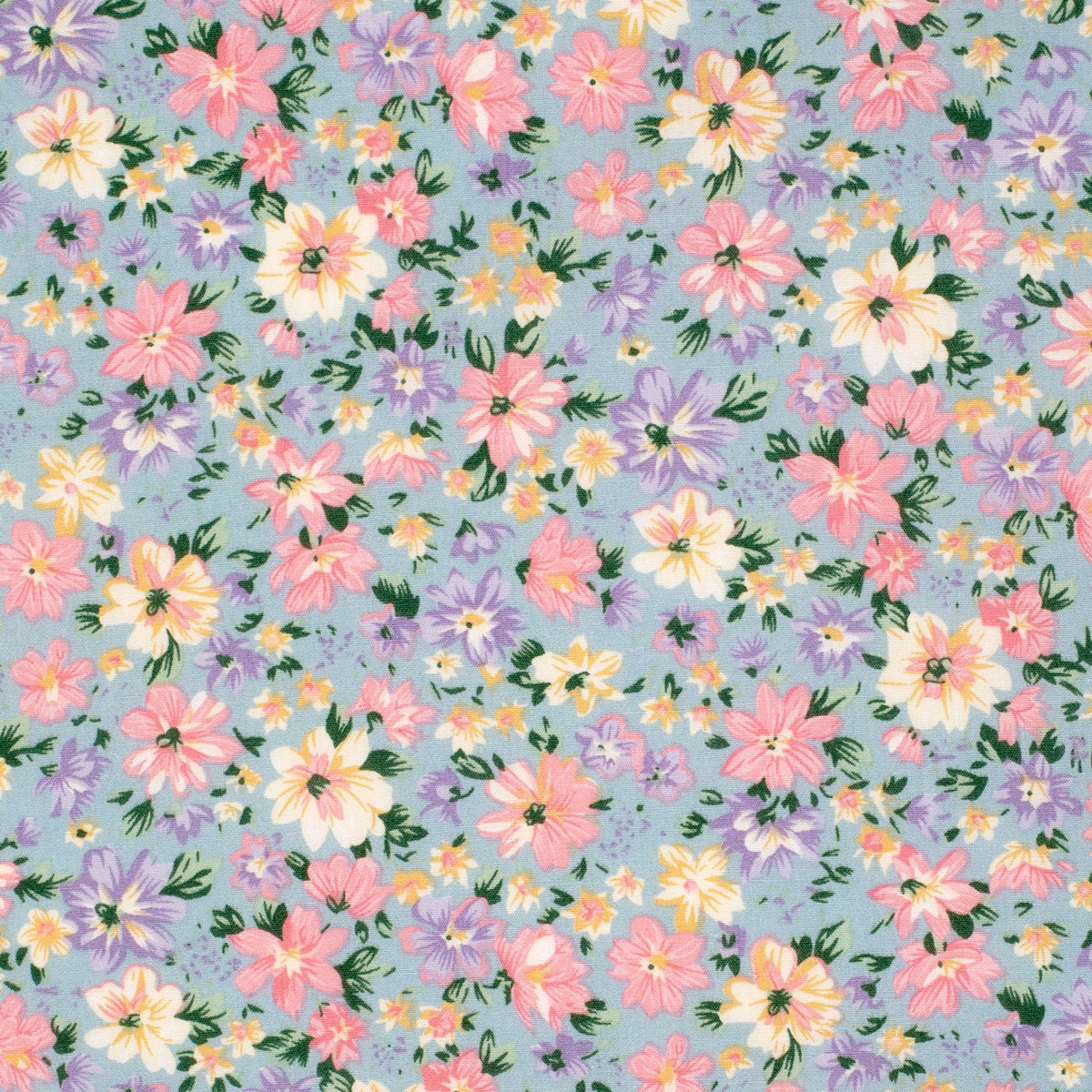 Just Country Women's Abbey Printed L/S Workshirt. Floral pattern with pink, purple, and yellow flowers on a light blue background