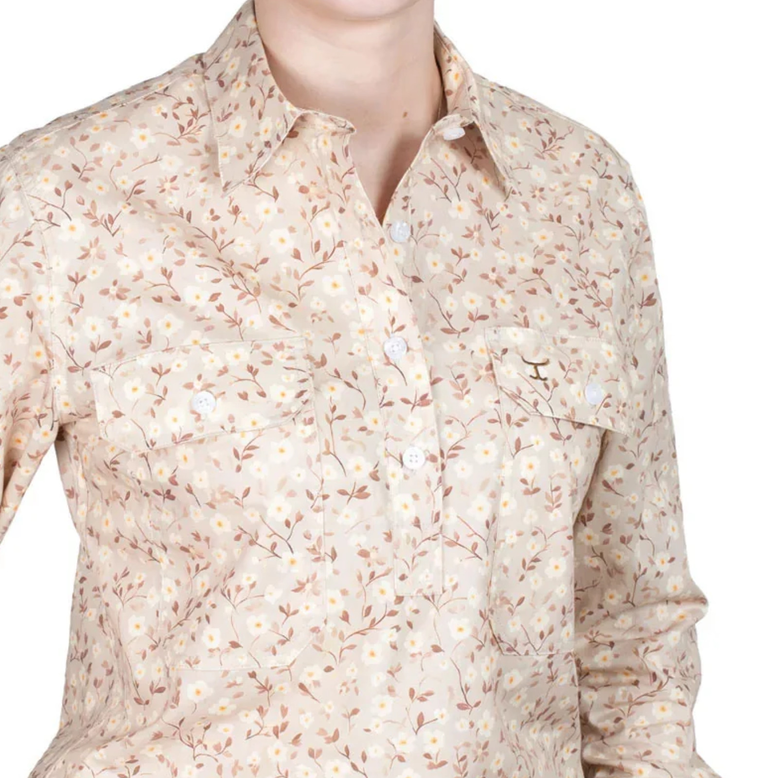 Beige floral patterned shirt on a white background
