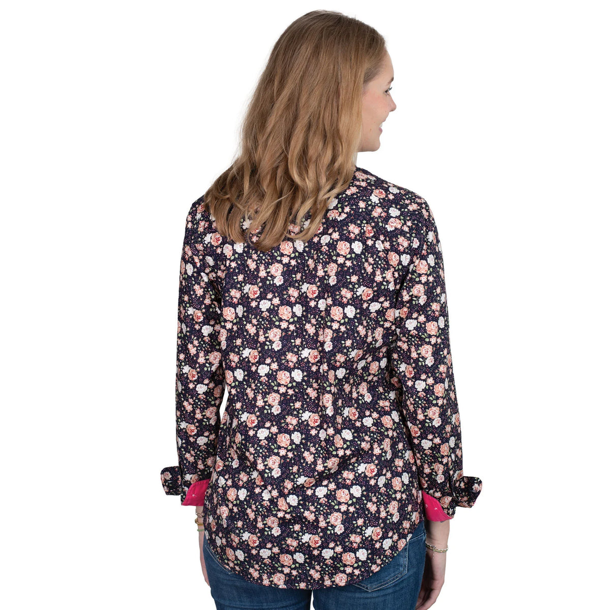 Just Country Women's Abbey Full Button Print Workshirt. Woman wearing a floral blouse with rolled-up sleeves on a white background