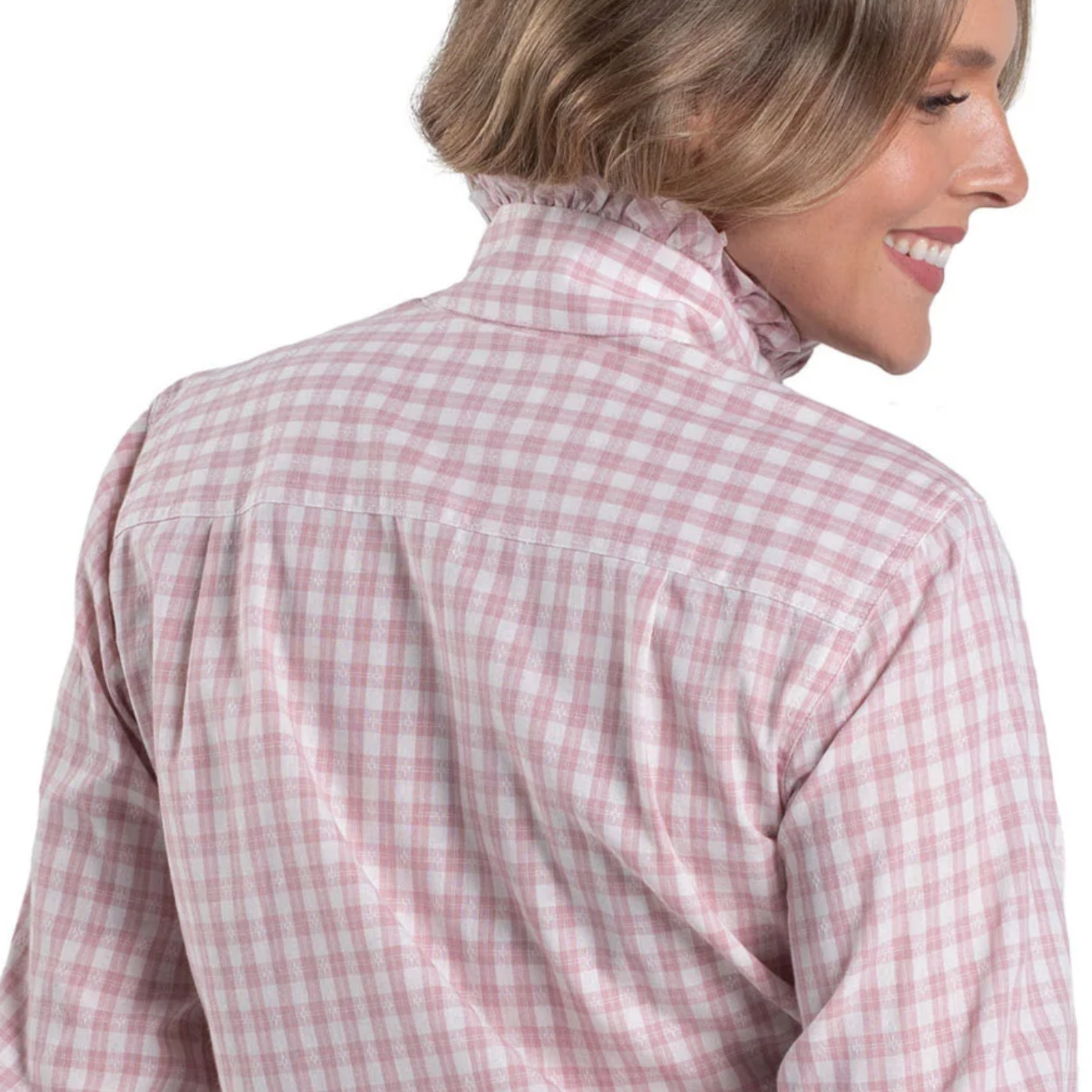 Woman wearing a pink and white checkered shirt on a white background
