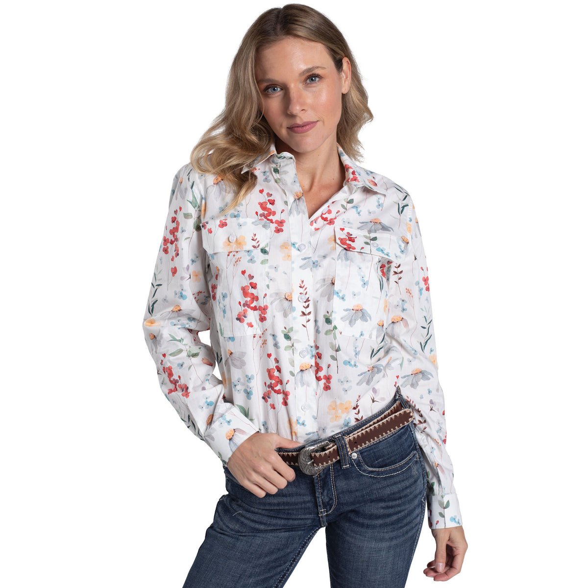 Woman wearing a floral shirt and jeans on a white background