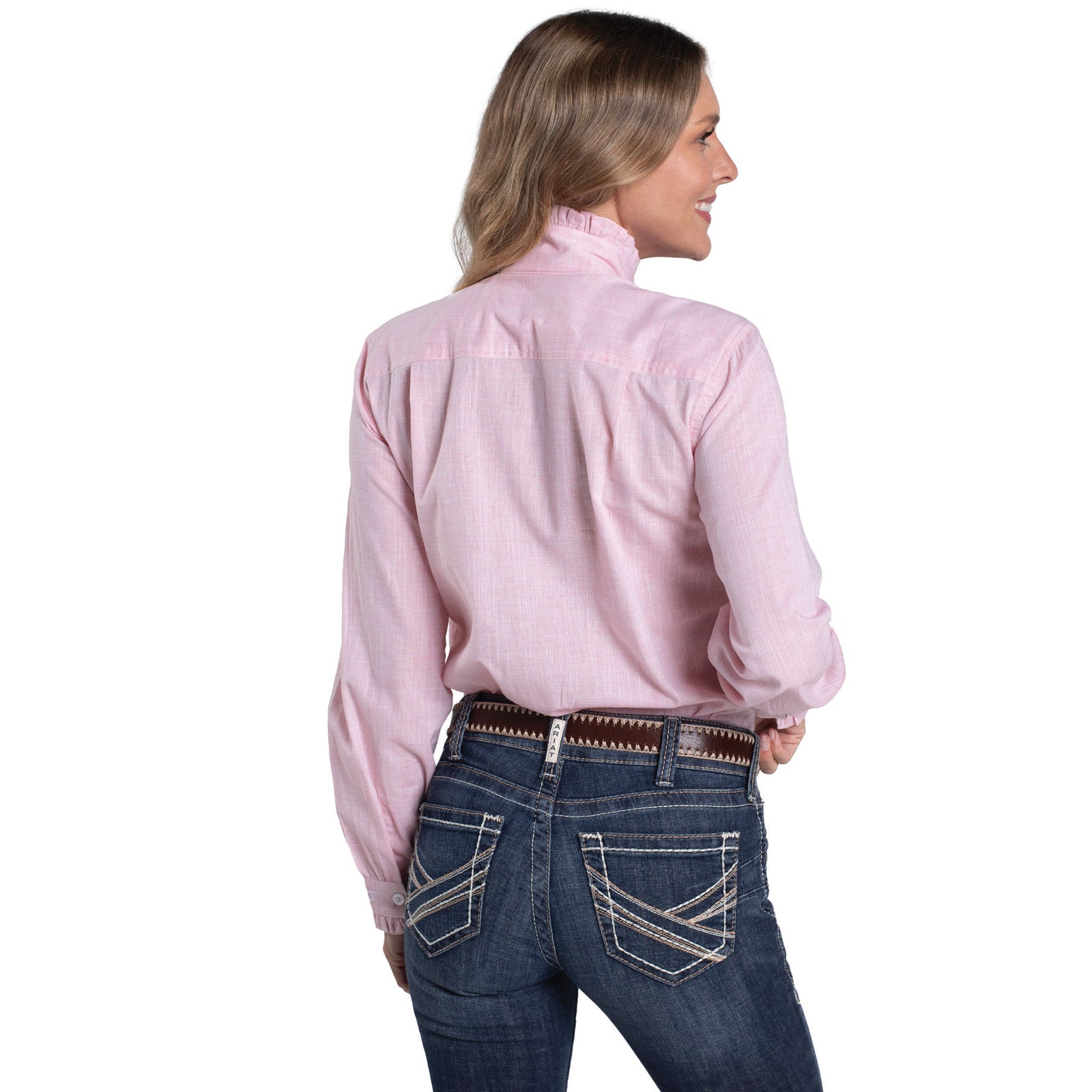 Woman wearing a pink long-sleeve shirt and blue jeans on a white background