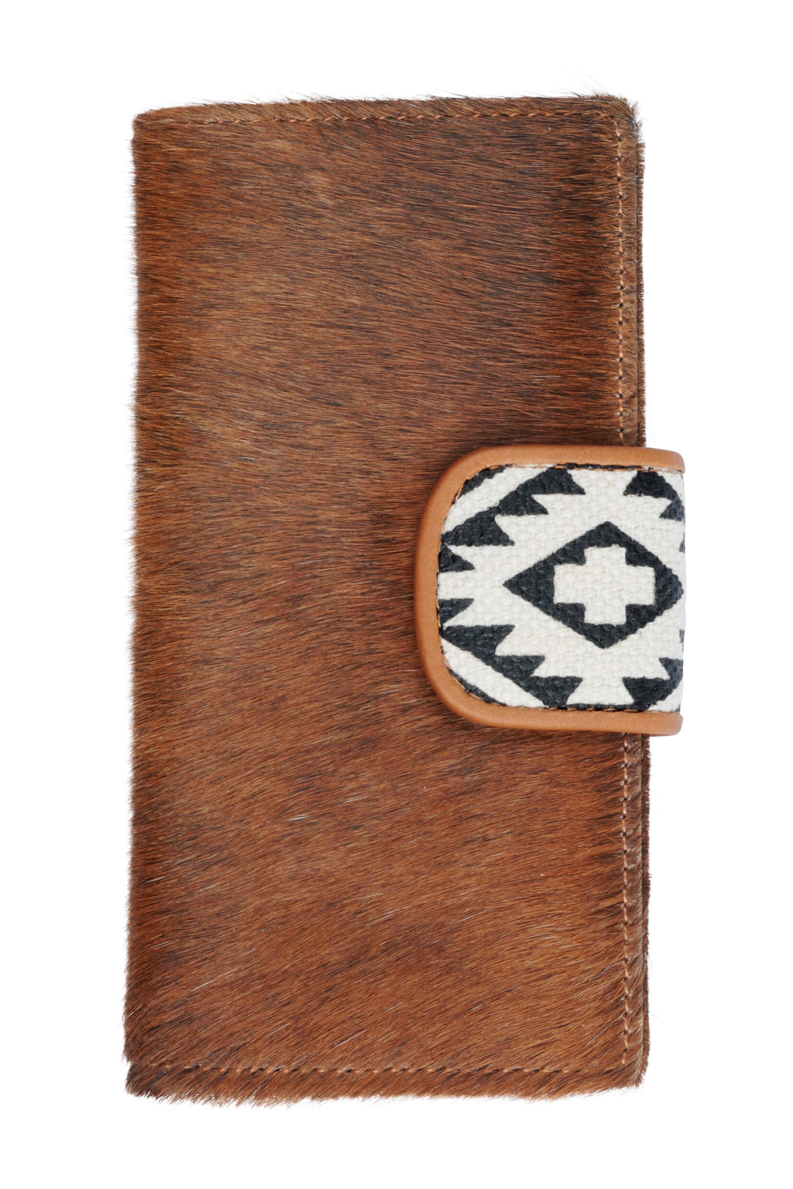 A brown bifold Wrangler Women's Ellery Western Wallet with a hair-on cowhide front panel and an Aztec printed canvas tab closure.