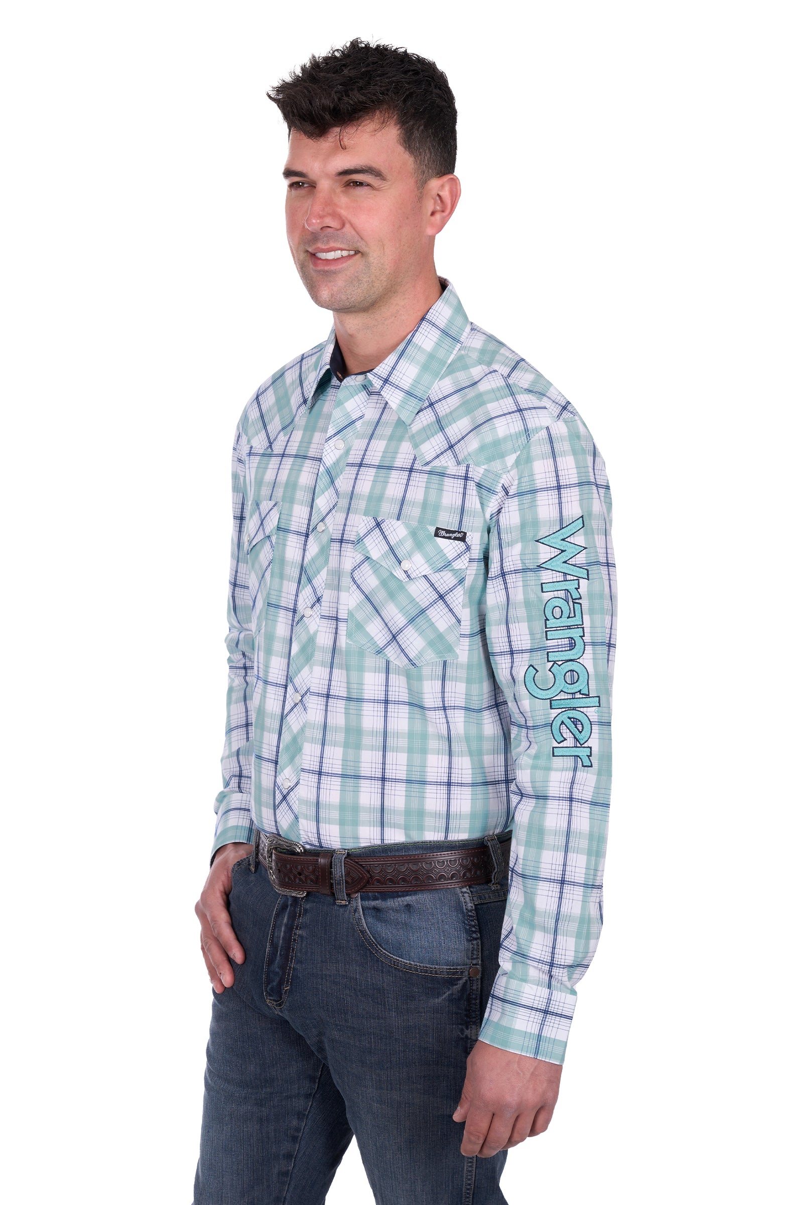 Wrangler Men's Jacob Logo L/S Western Shirt. Man wearing a green and white checkered shirt with 'Wrangler' branding on a white background