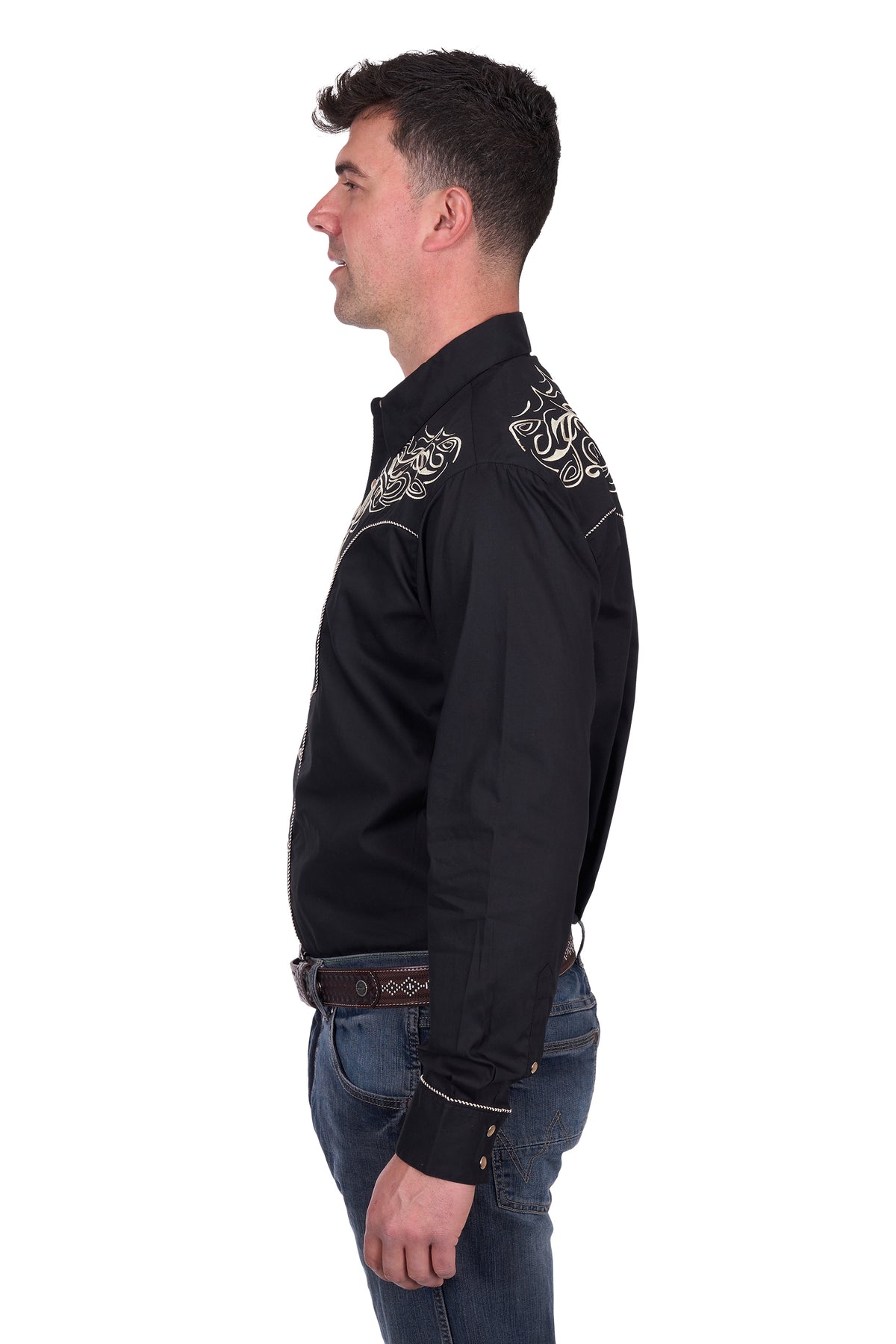 Wrangler Men's Carlos Embroidered L/S Western Shirt. Man wearing a black embroidered shirt with white patterns on a white background