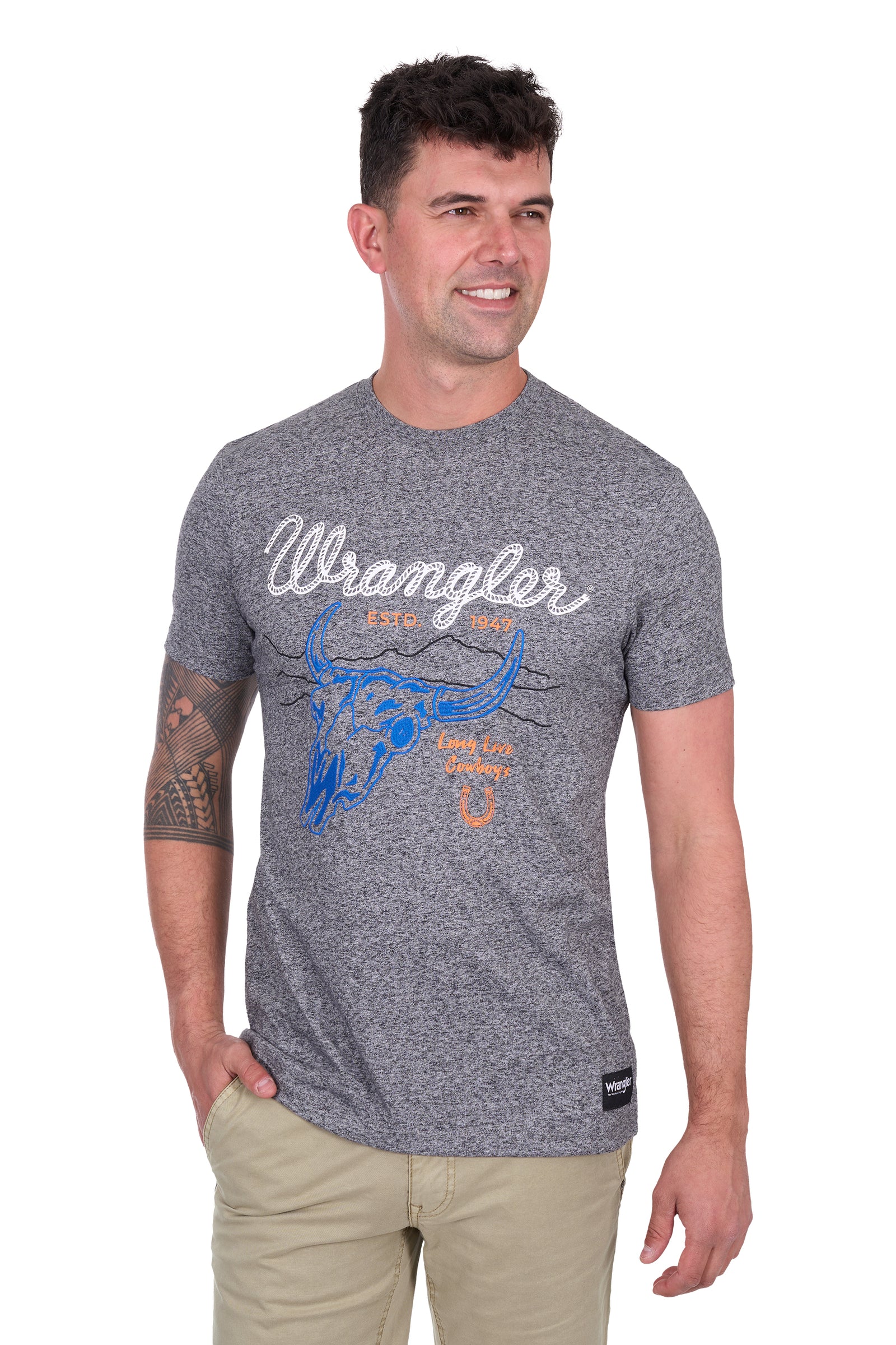 Wrangler Men's Darren S/S T-Shirt. Man wearing a gray 'Wrangler' t-shirt with a blue bull graphic on a white background