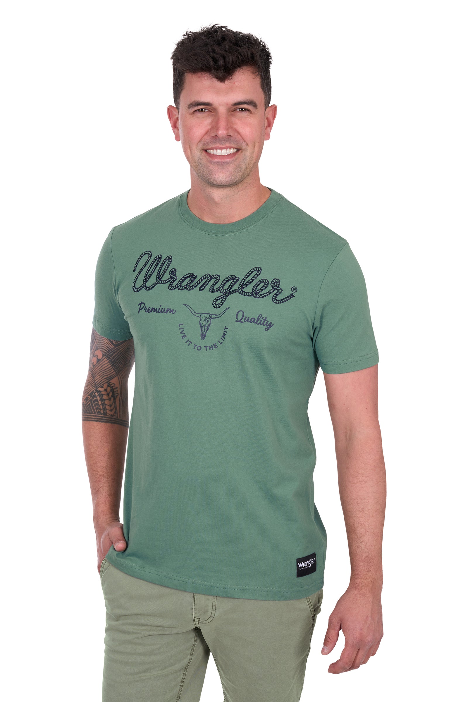 Wrangler Men's Arthur S/S T-Shirt. Man wearing a green Wrangler t-shirt on a white background