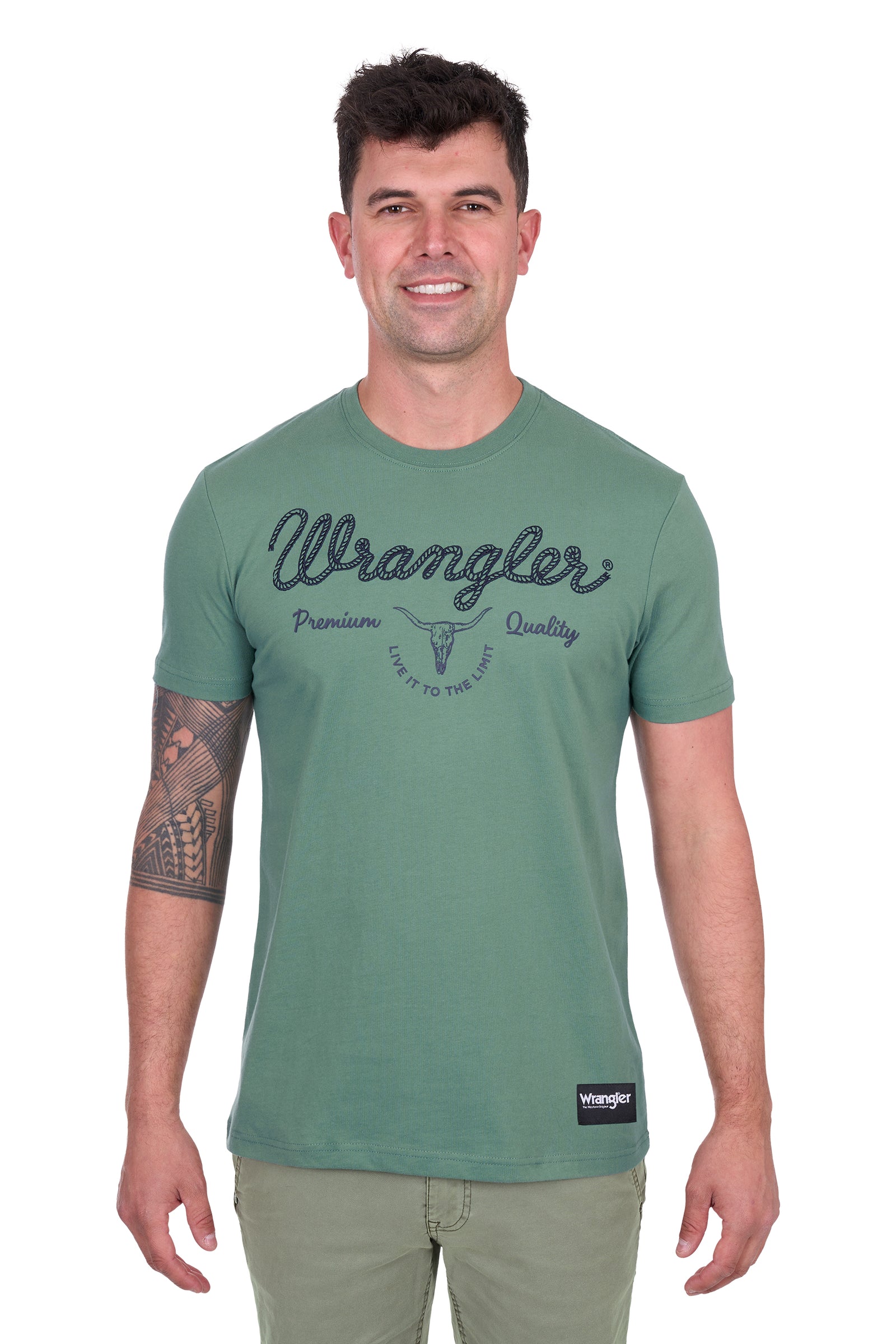 Wrangler Men's Arthur S/S T-Shirt. Man wearing a green Wrangler t-shirt on a white background