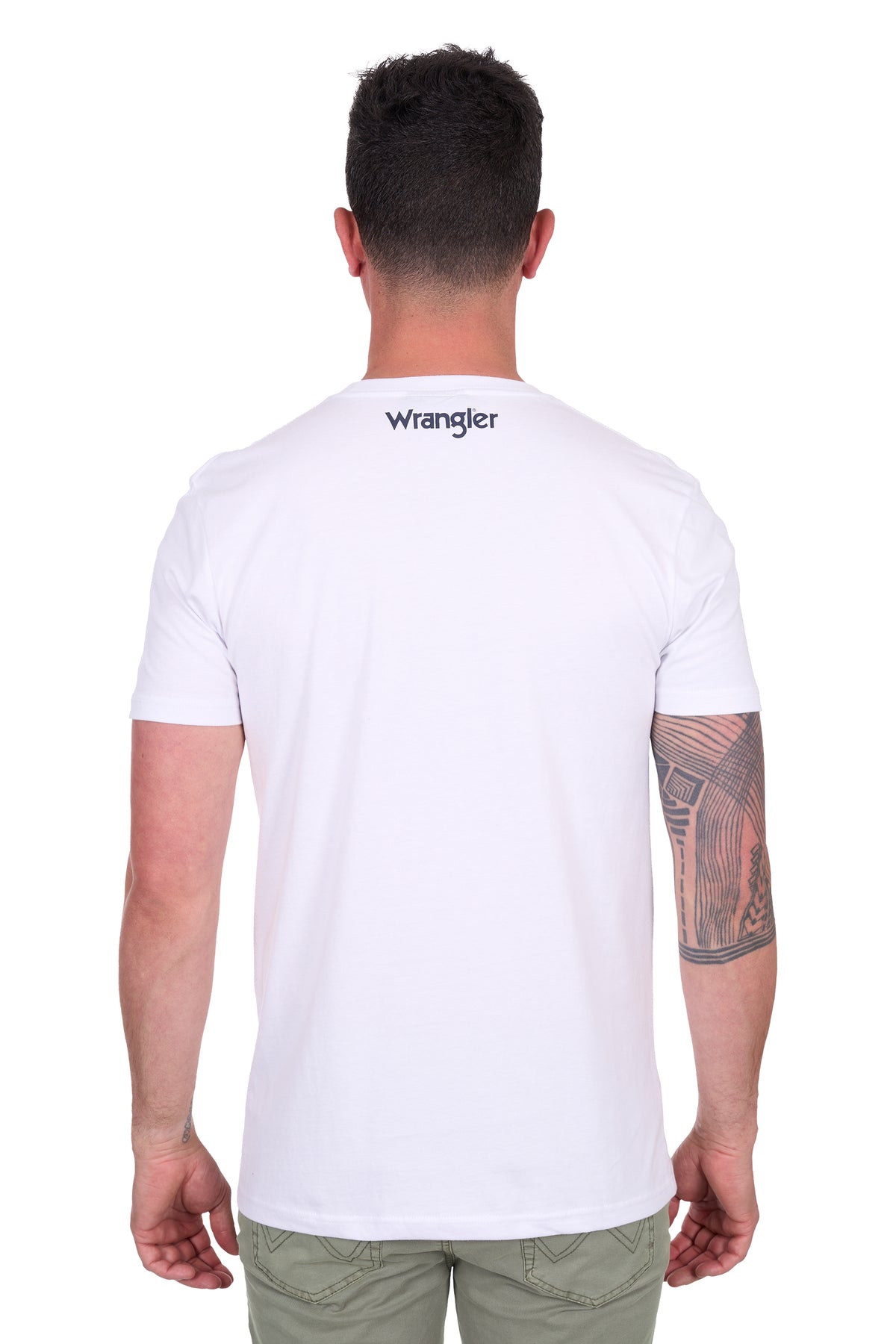 Wrangler Men's Lance S/S T-Shirt. Man wearing a white t-shirt with 'Wrangler' logo on the back, standing against a white background.