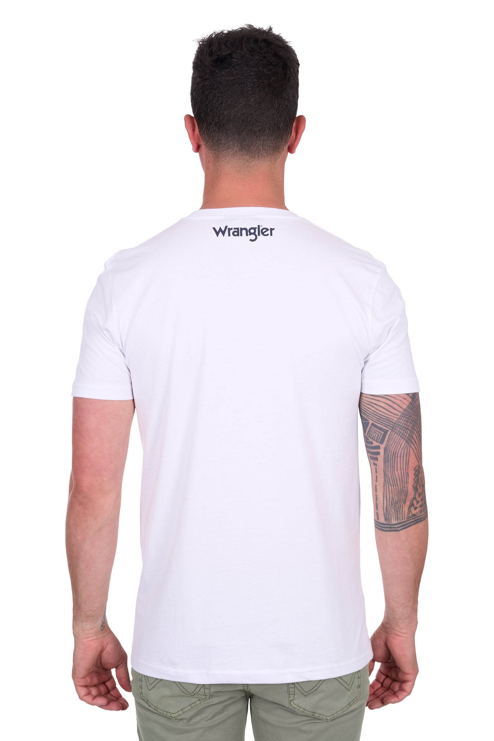 Wrangler Men's Lance S/S T-Shirt. Man wearing a white Wrangler t-shirt with a graphic design on a white background