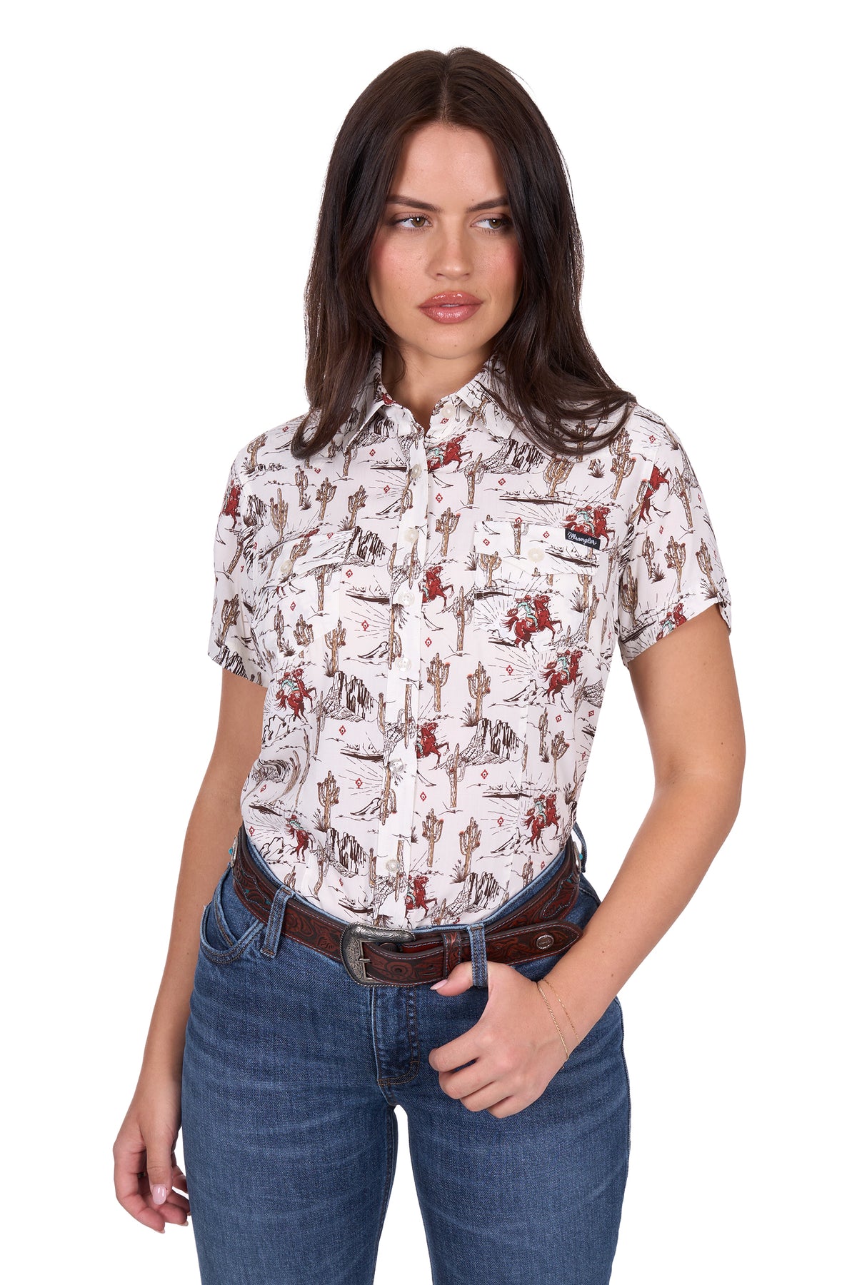 Wrangler Women&#39;s Celeste S/S Western Shirt. Woman wearing a patterned shirt and jeans on a white background