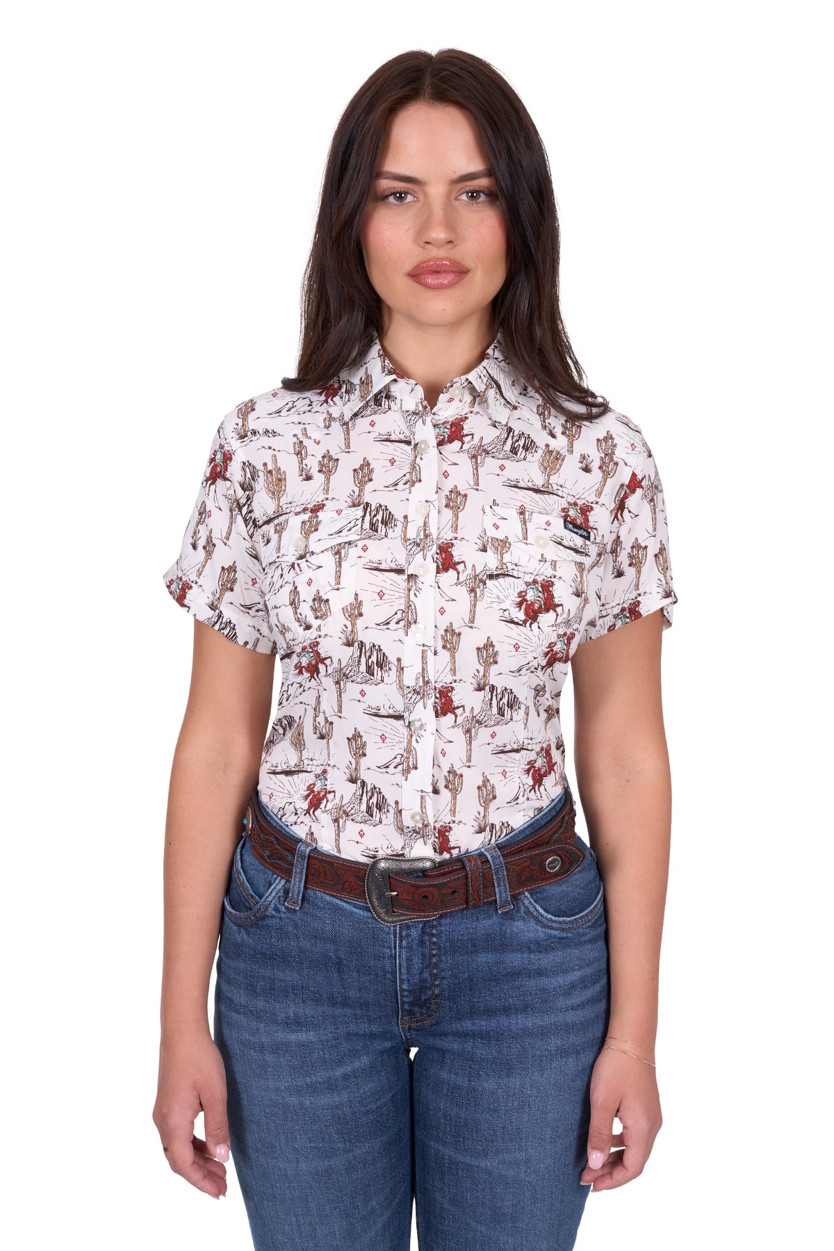 Wrangler Women's Celeste S/S Western Shirt. Woman wearing a patterned shirt and jeans on a white background