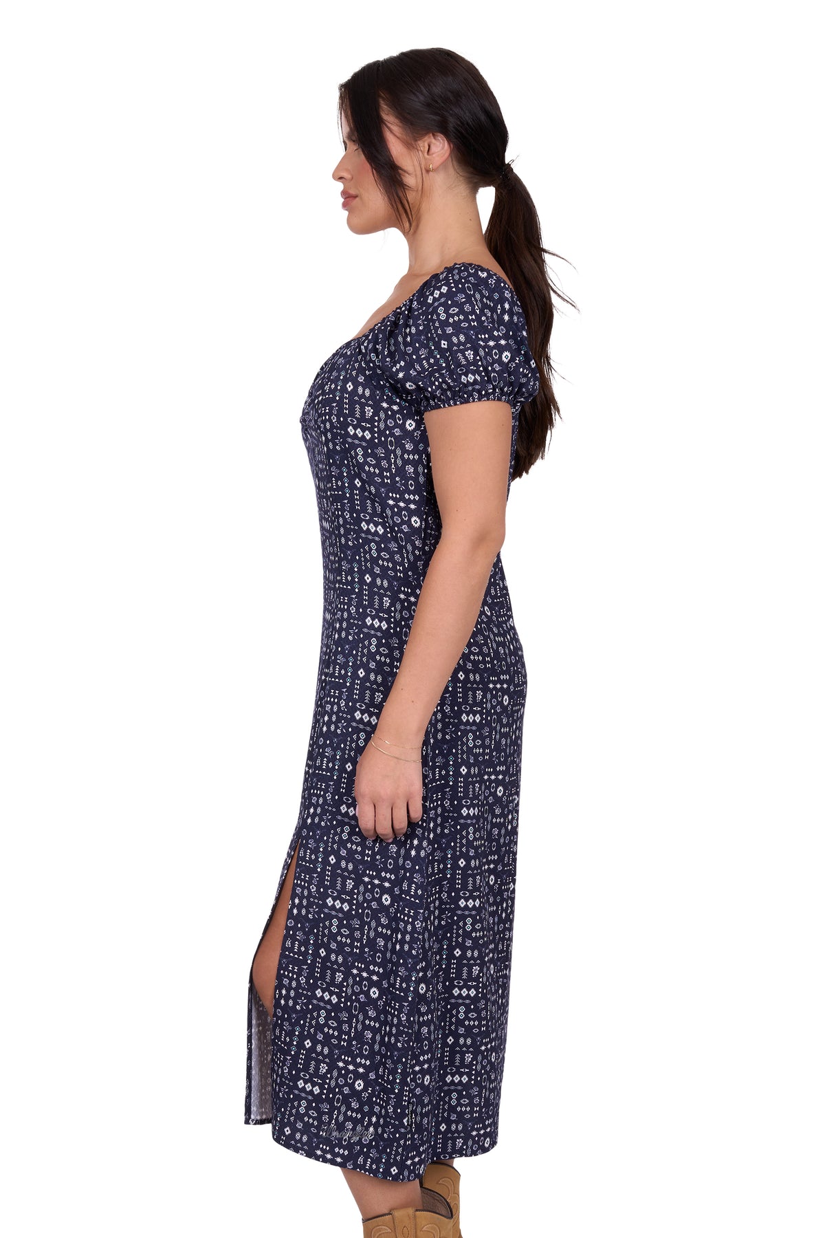 Wrangler Women's Beth Dress. Woman wearing a navy blue dress with white patterns on a white background