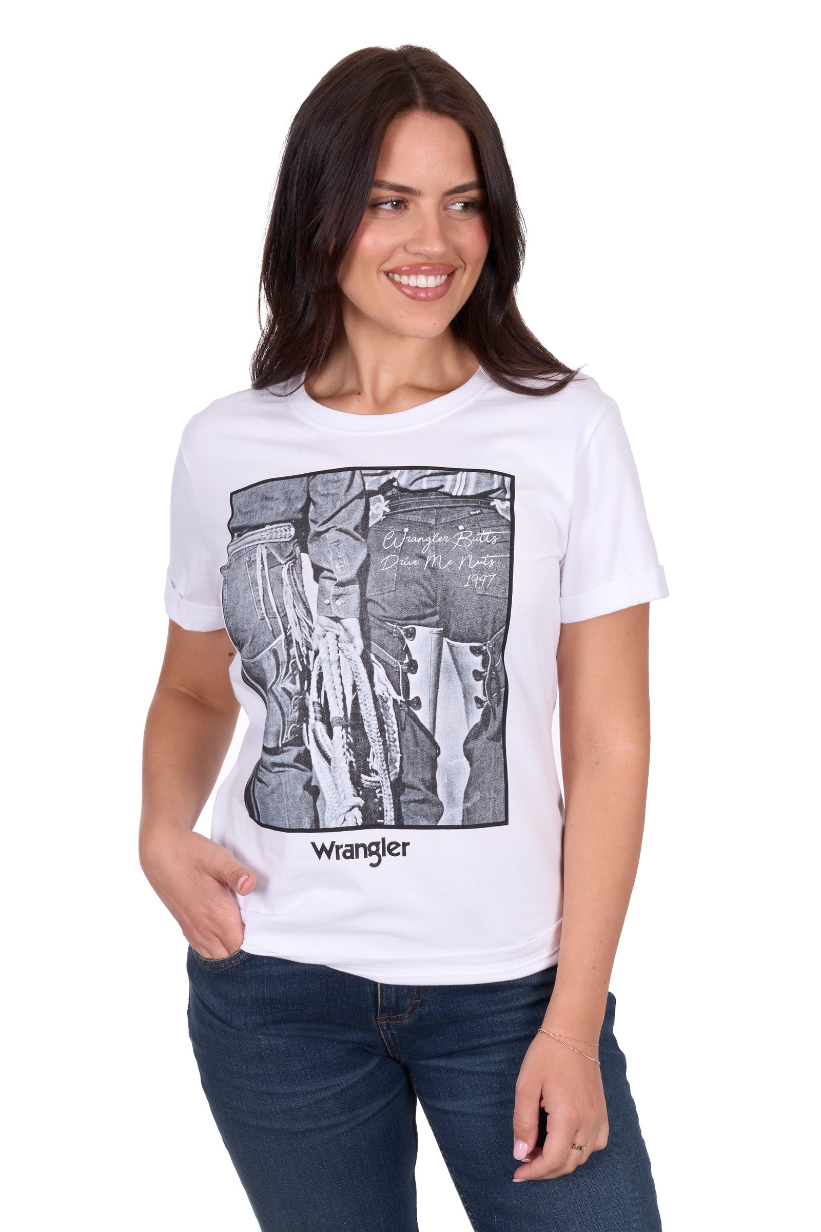 Wrangler Women's Julia S/S T-Shirt. Woman wearing a white t-shirt with a graphic design and 'Wrangler' branding.