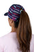 Wrangler Women's Eliza High Profile Ponytail Trucker Cap. Person wearing a colorful striped cap with a ponytail, on a white background