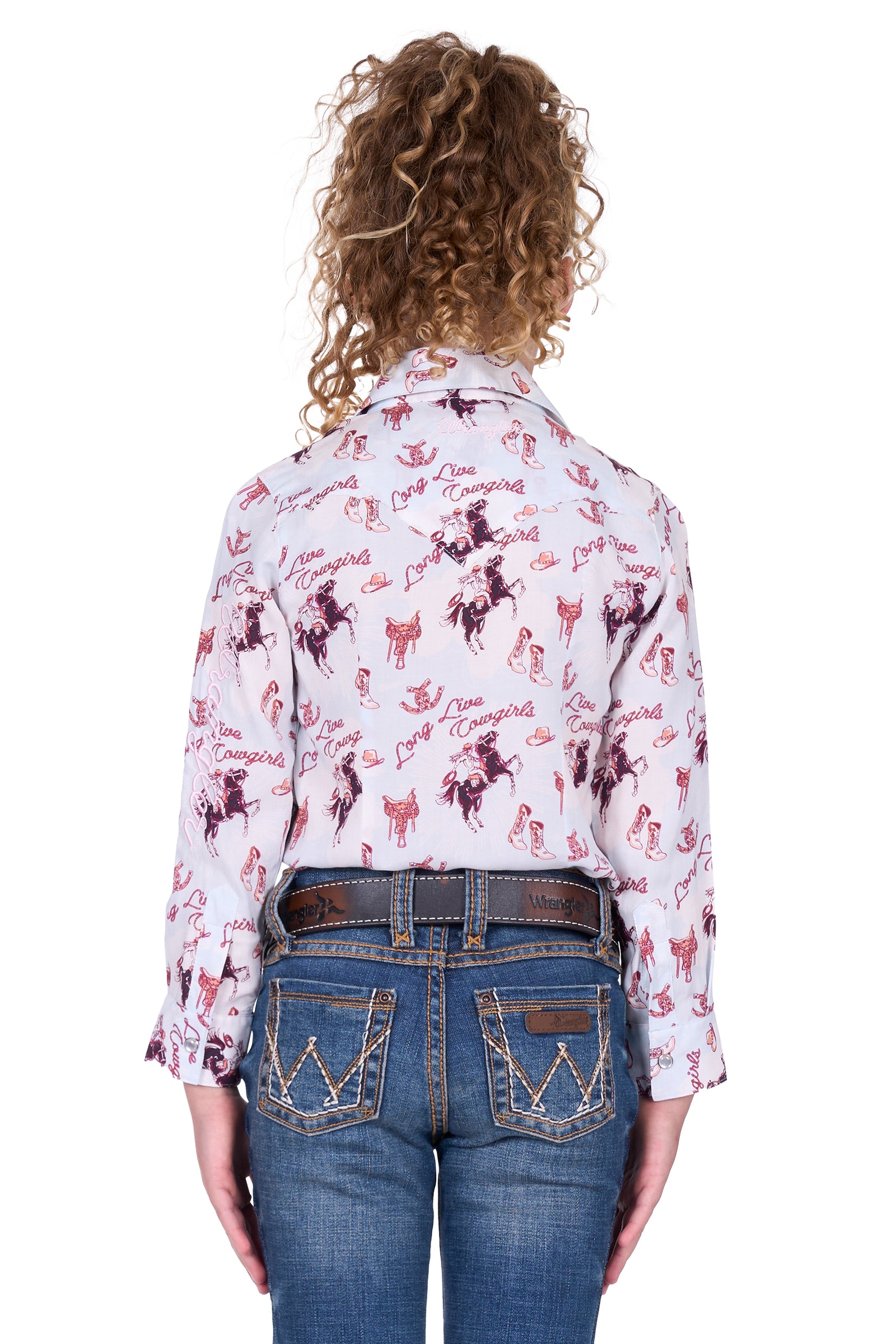 Wrangler Girl's Doreen L/S Western Shirt. Person wearing a patterned shirt and jeans on a white background
