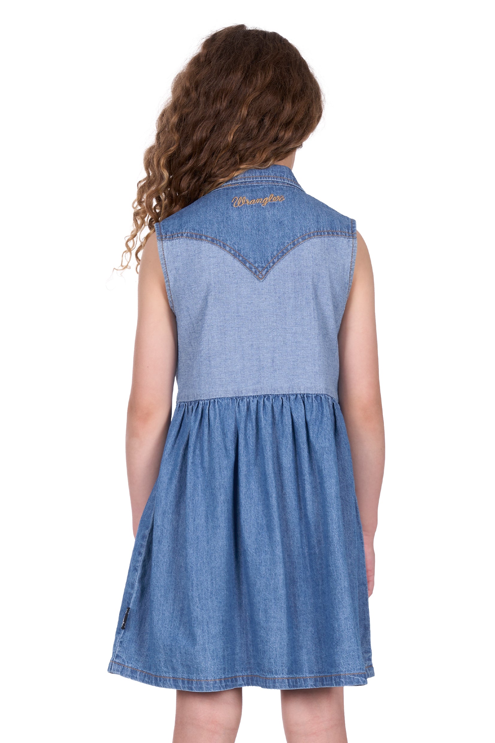Wrangler Girl's Joanna Sleeveless Dress. Blue denim dress worn by a person on a white background