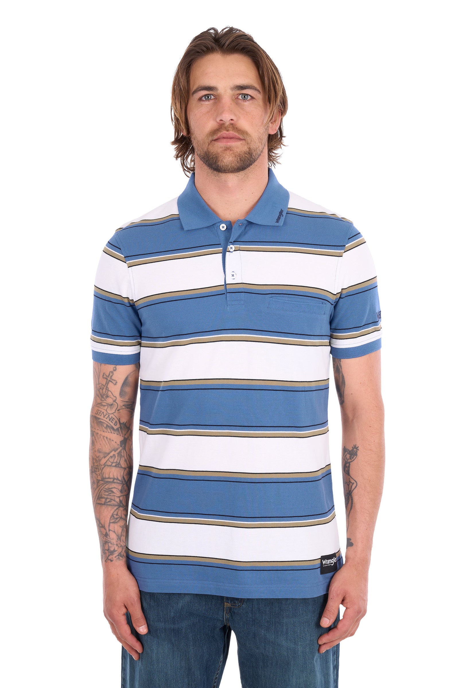 A man wearing a blue and white striped short-sleeve polo shirt with thin tan stripes, paired with blue jeans, photographed against a plain white background.