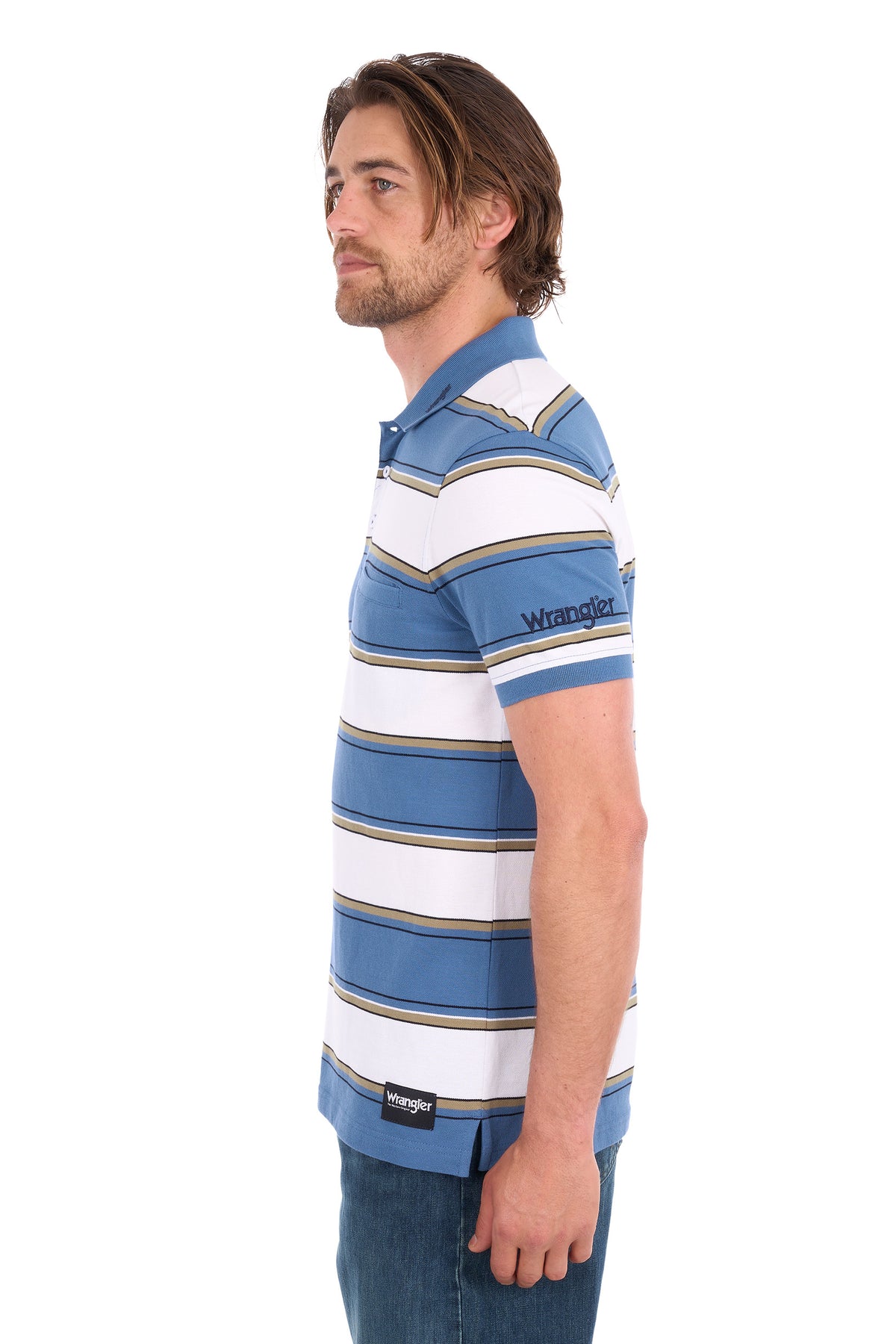 A man shown in profile wearing a Wrangler short-sleeve polo shirt with horizontal blue, white, and tan stripes, paired with blue jeans, against a plain white background.