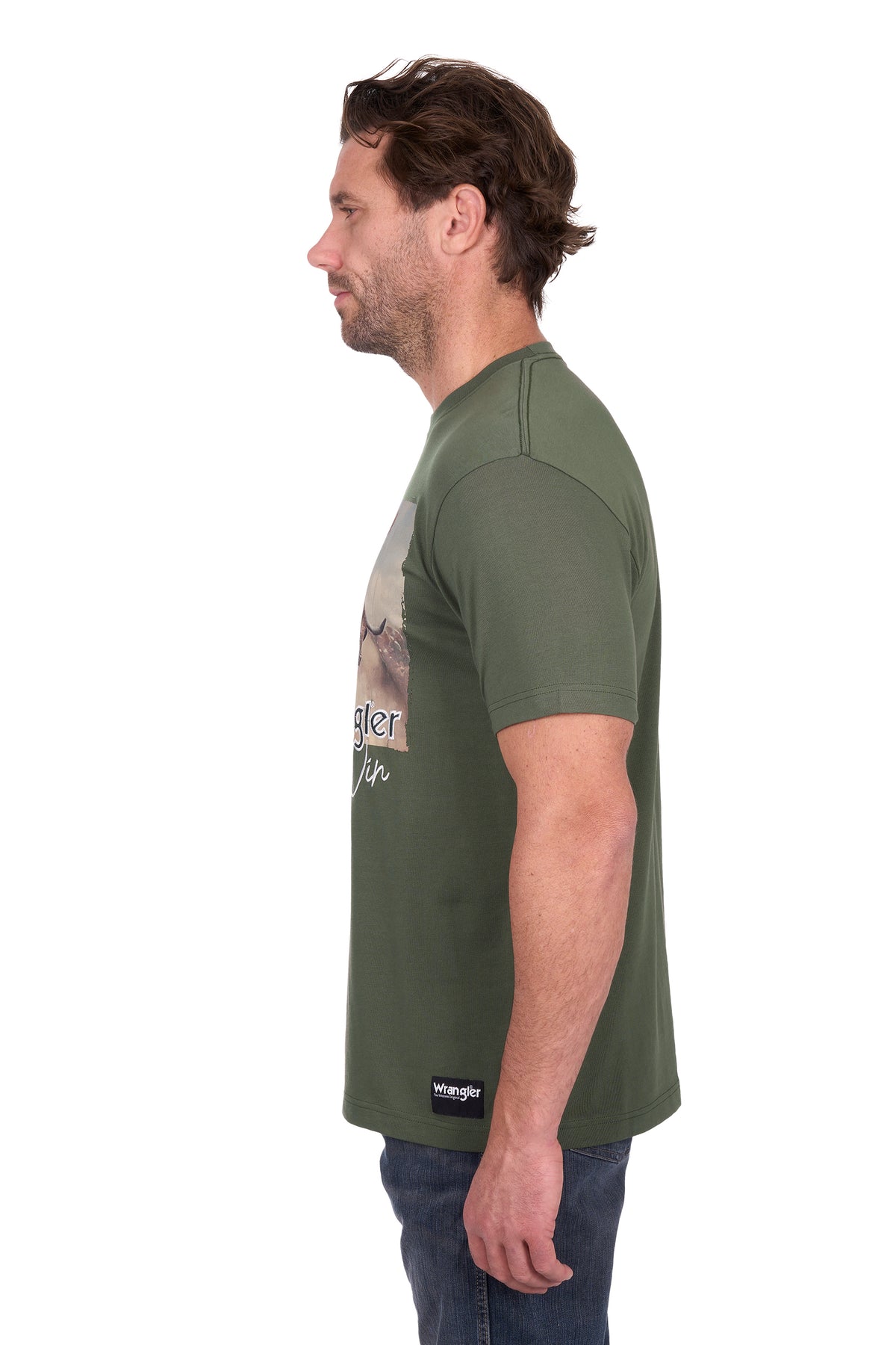 Man wearing a green t-shirt with a graphic design on a white background