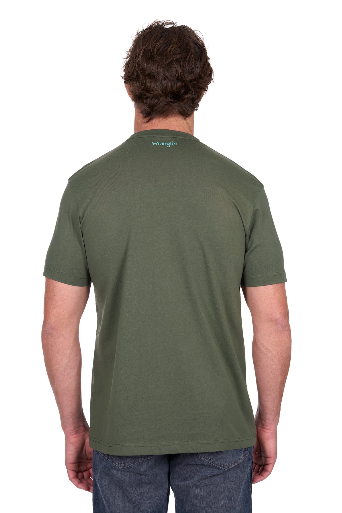 Person wearing a green t-shirt with a brand logo on the back, standing against a white background