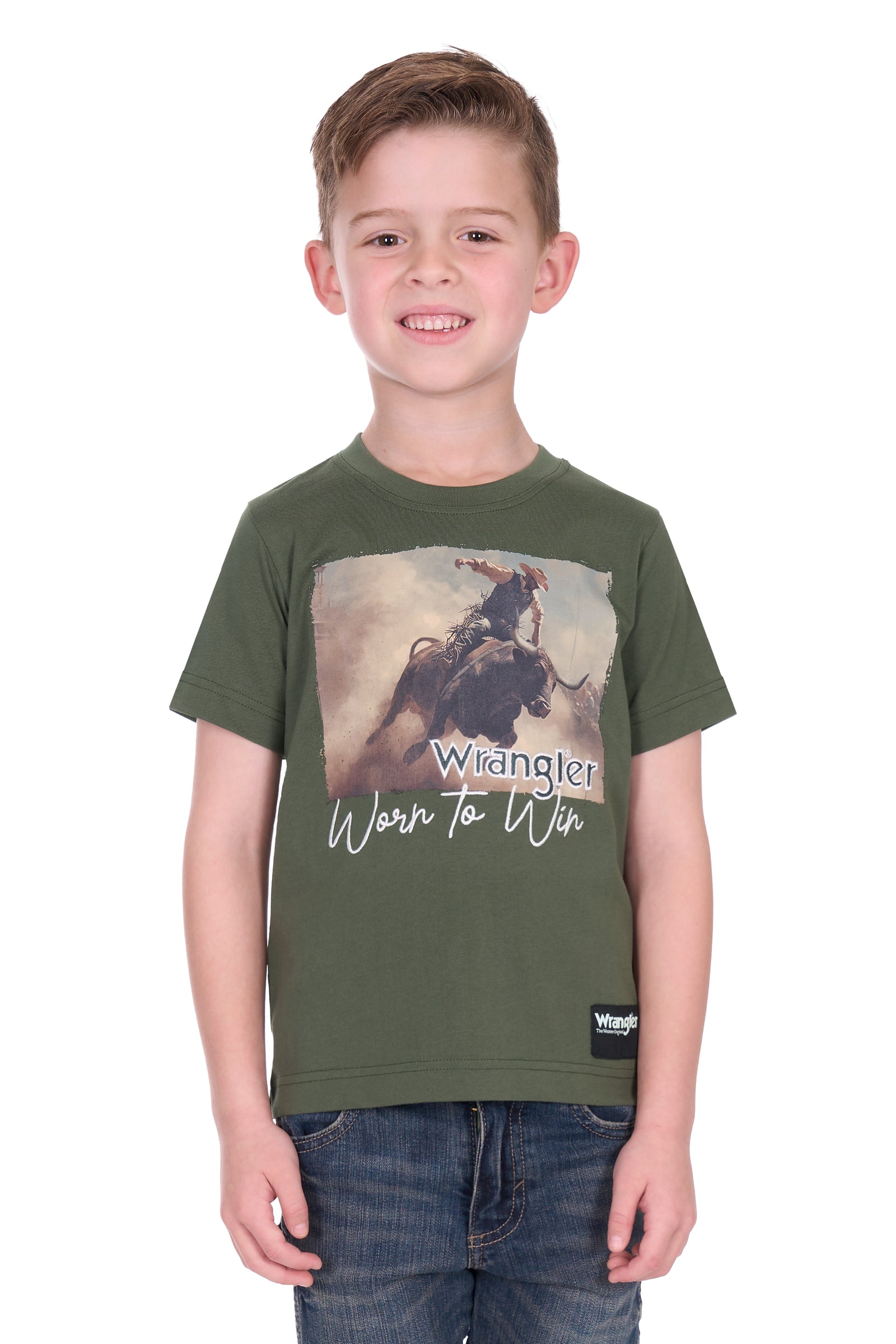 Child wearing a green t-shirt with a graphic design on a white background
