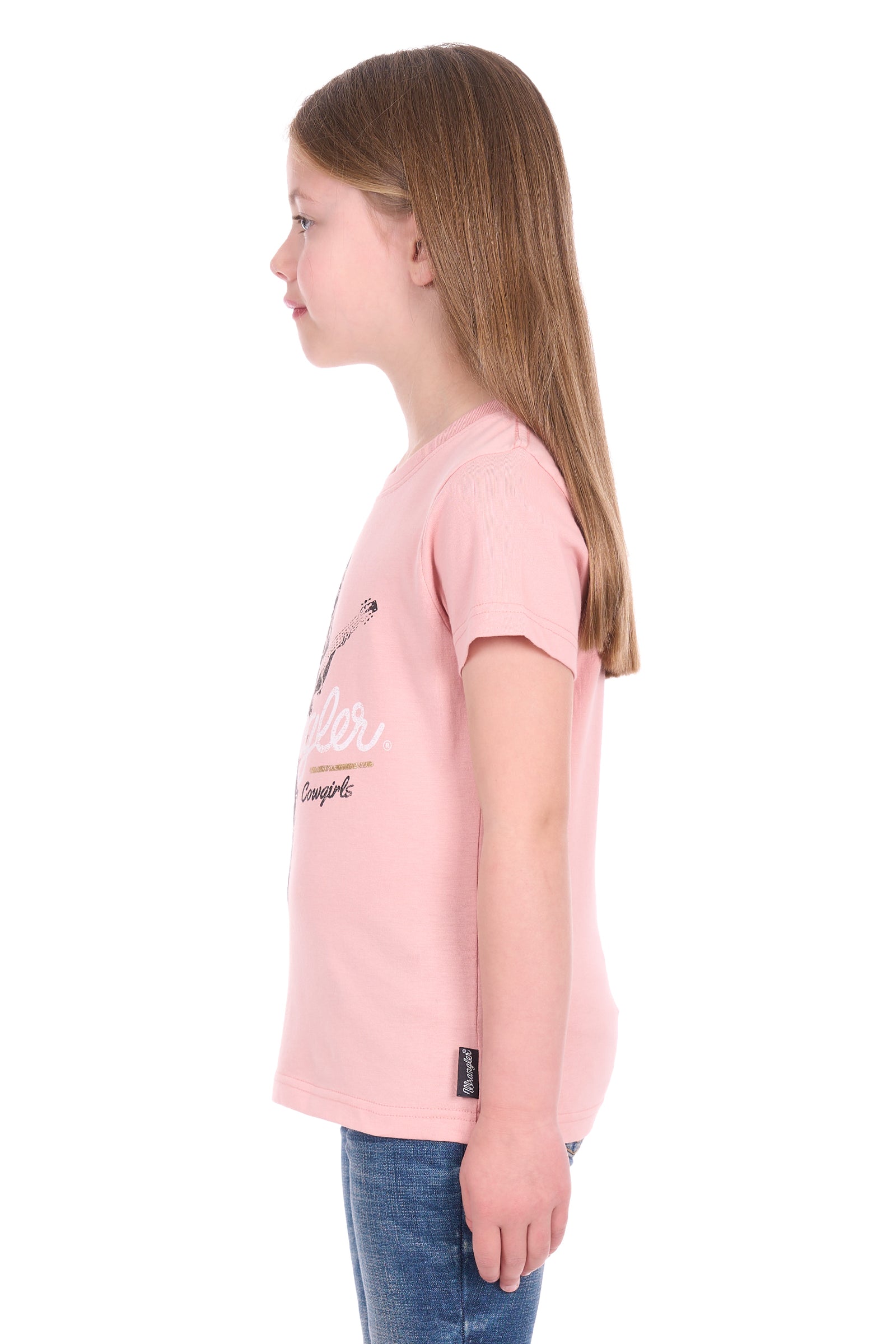 Young girl wearing a pink t-shirt with a graphic design on a white background