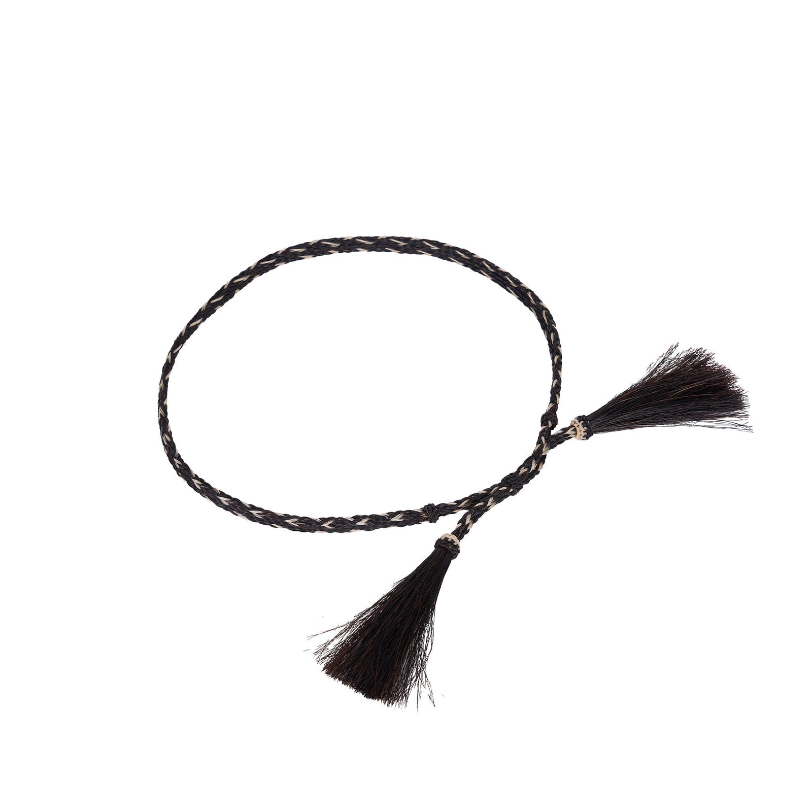 Wrangler Horsehair Hat Band. Black braided hair tie with tassels on a white background