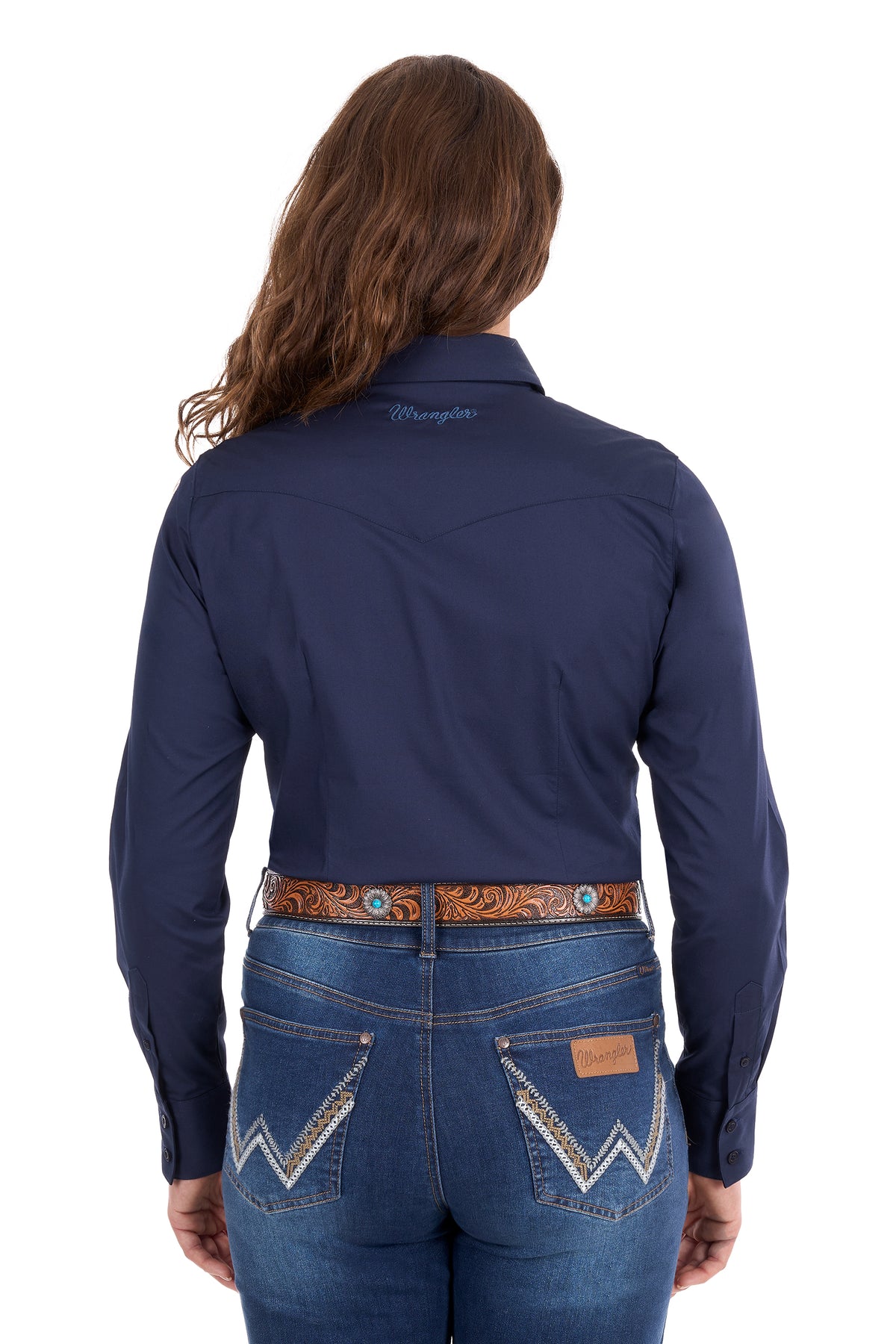 Rear view of a woman wearing a navy blue long-sleeve western shirt and blue jeans with western-style stitching, on a white background.