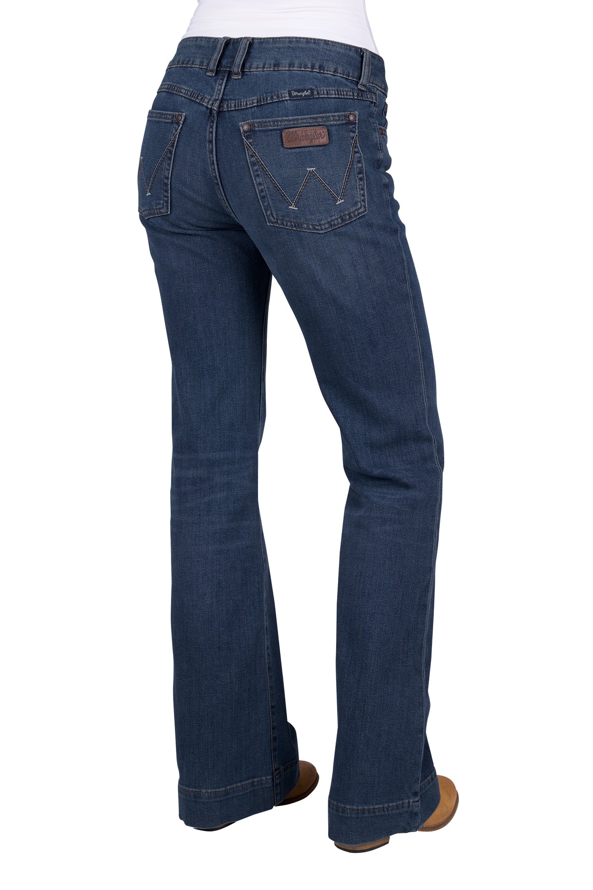 A pair of Wrangler Women's Mae Blair Trousers in a blue denim color, featuring a mid-rise waist, two front scoop pockets, and a gradual opening down the leg.
