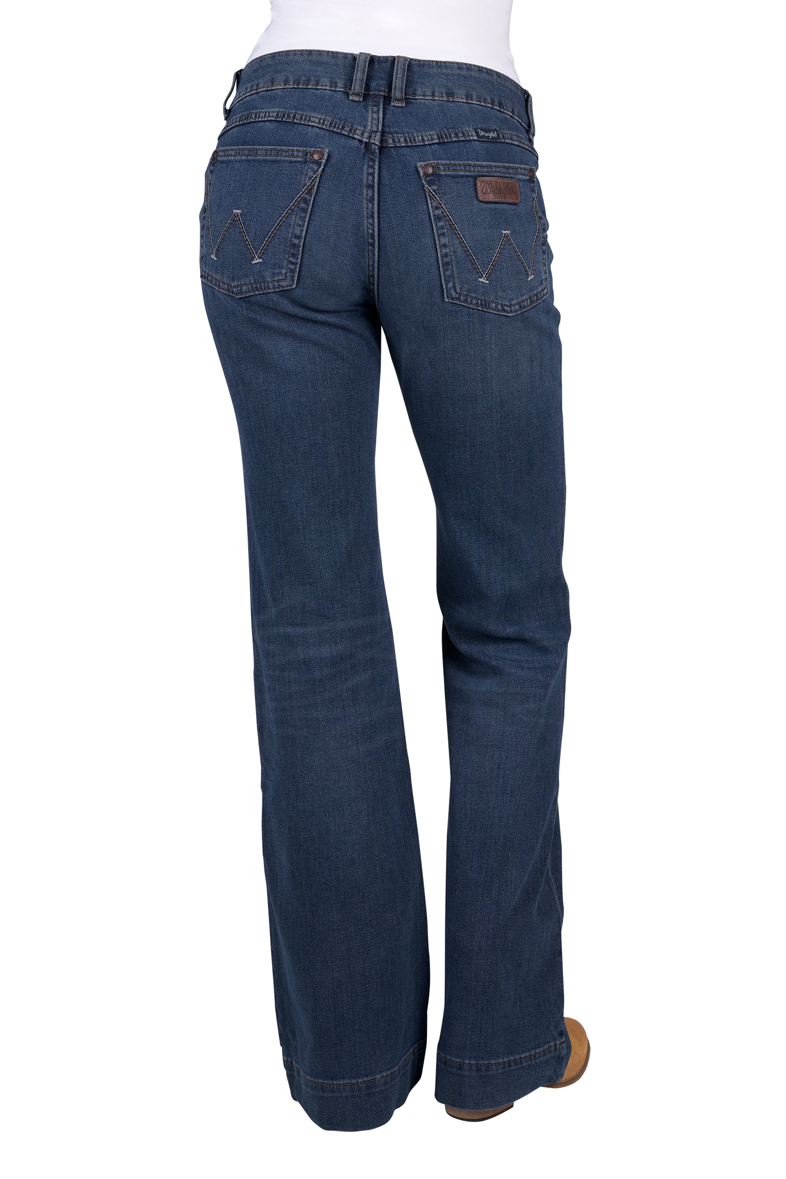 A pair of Wrangler Women's Mae Blair Trousers in a blue denim color, featuring a mid-rise waist, two front scoop pockets, and a gradual opening down the leg.