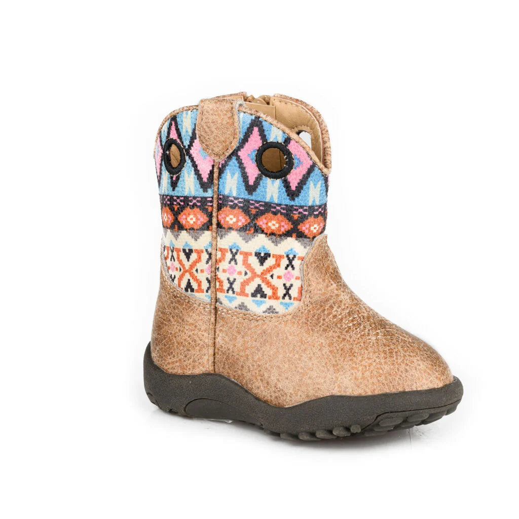 Children's boot with patterned top and beige body on a white background