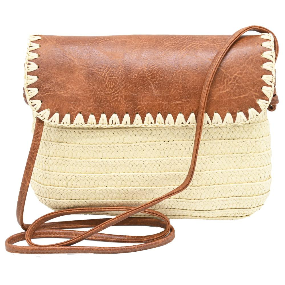 A woven straw crossbody bag with a brown faux-leather flap and matching brown strap, featuring a decorative cream-colored stitched border.