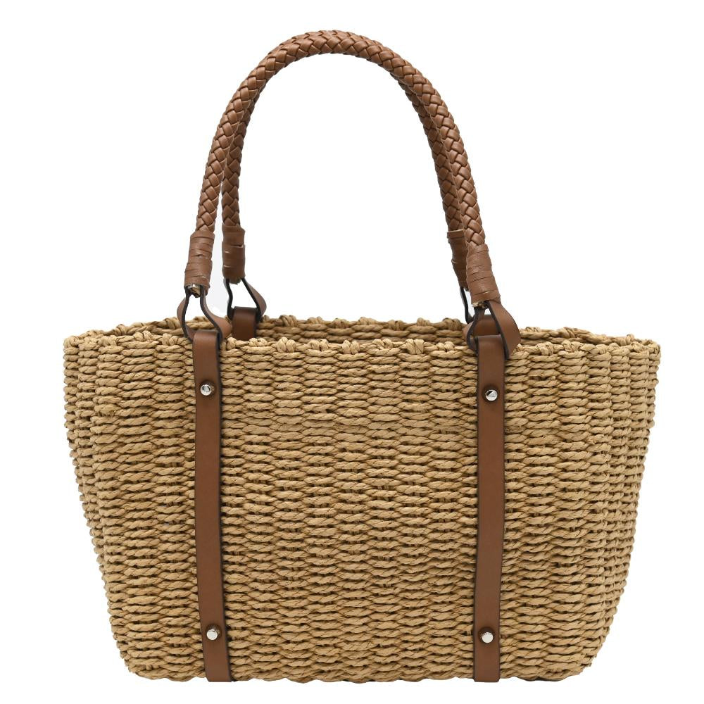 A natural woven straw tote bag with brown leather handles and side straps, shown against a plain white background.